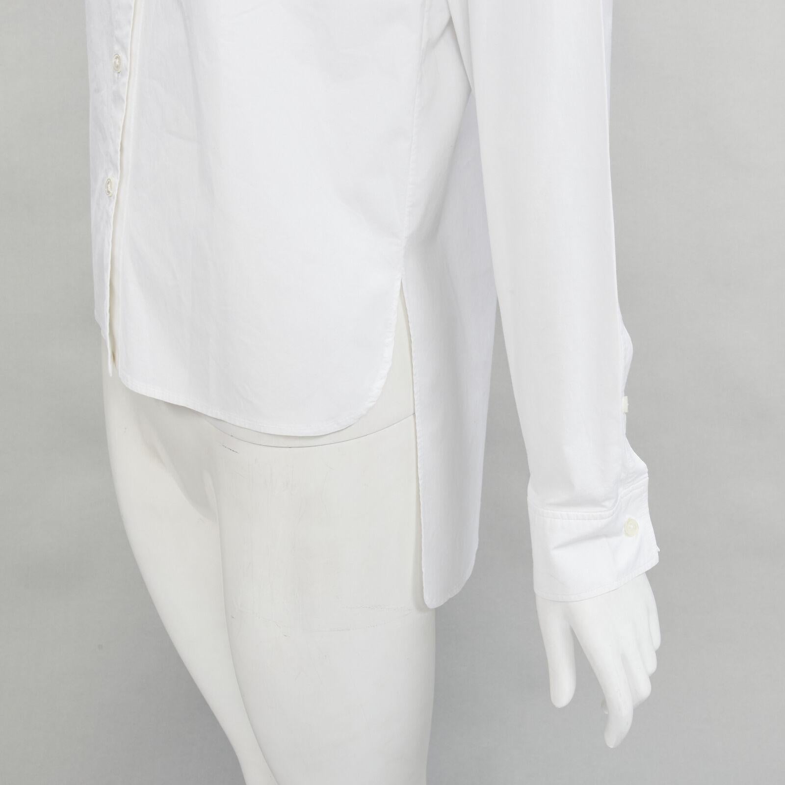 JEAN PAUL GAULTIER white cotton high low hem button up shirt IT38 XS
Reference: JACG/A00079
Brand: Jean Paul Gaultier
Designer: Jean Paul Gaultier
Material: Cotton
Color: White
Pattern: Solid
Closure: Button
Extra Details: Slit at collar for collar