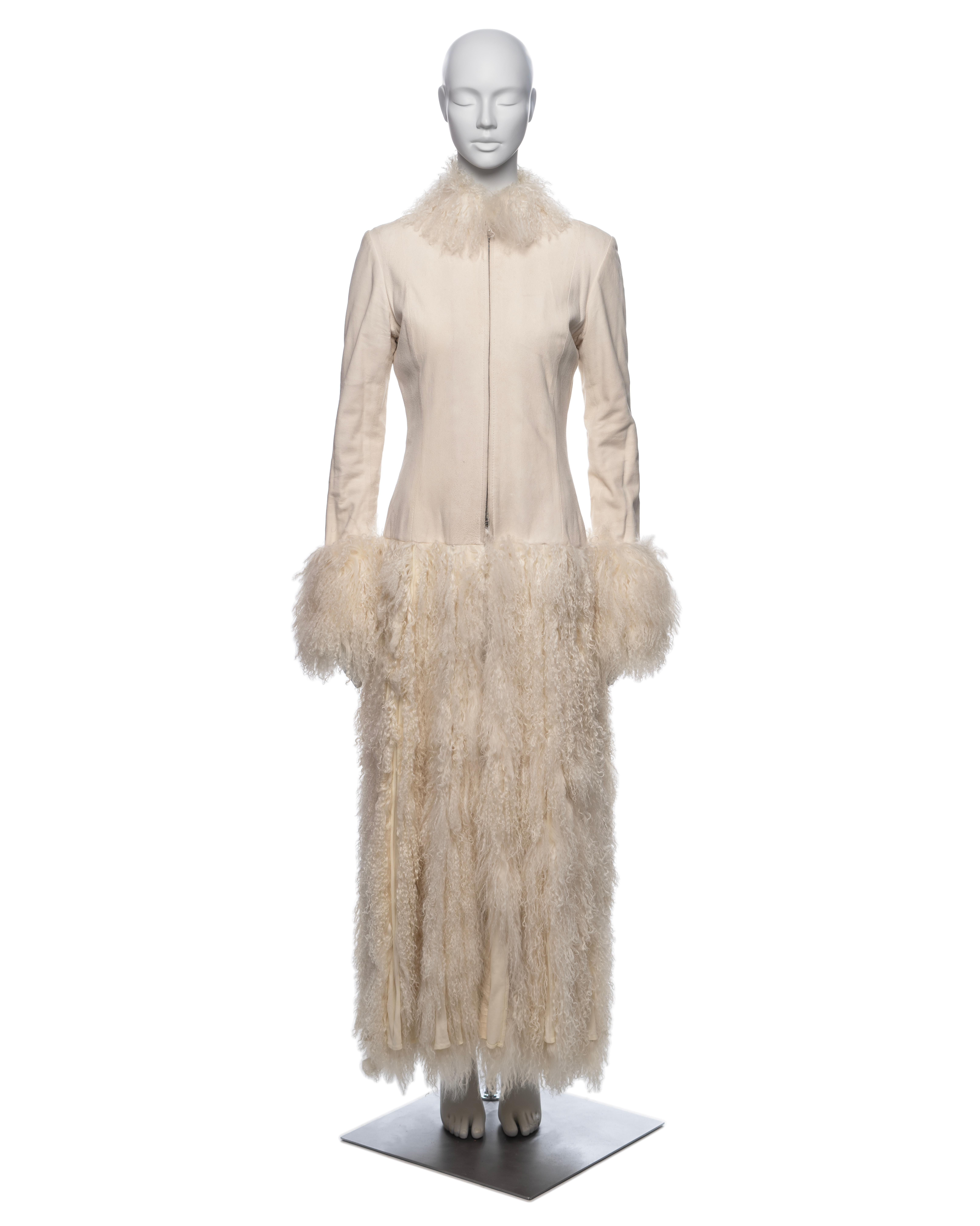 ▪ Brand: Jean Paul Gaultier
▪ Creative Director: Jean Paul Gaultier
▪ Collection: Fall-Winter 2006
▪ Fabric: Mongolian Lamb Fur, Antilope Leather
▪ Details: Features a fitted bodice with shearling lining and a zip-up closure, complemented by a maxi