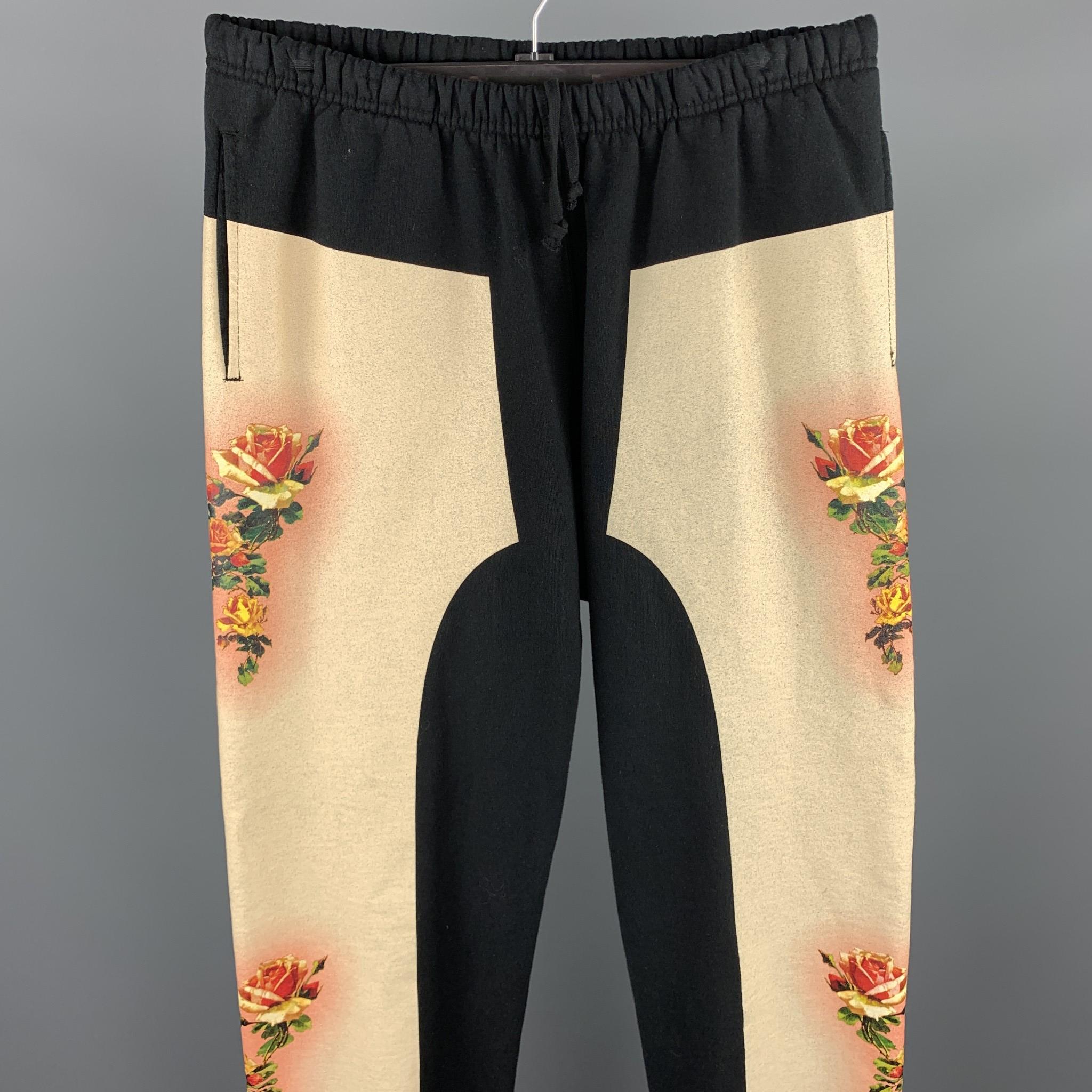 JEAN PAUL GAULTIER x SUPREME sweatpants comes in a black & beige cotton with a floral trim detail featuring a drawstring closure. Made in Canada.

Excellent Pre-Owned Condition.
Marked: XL

Measurements:

Waist: 34 in. 
Rise: 11.5 in. 
Inseam: 33