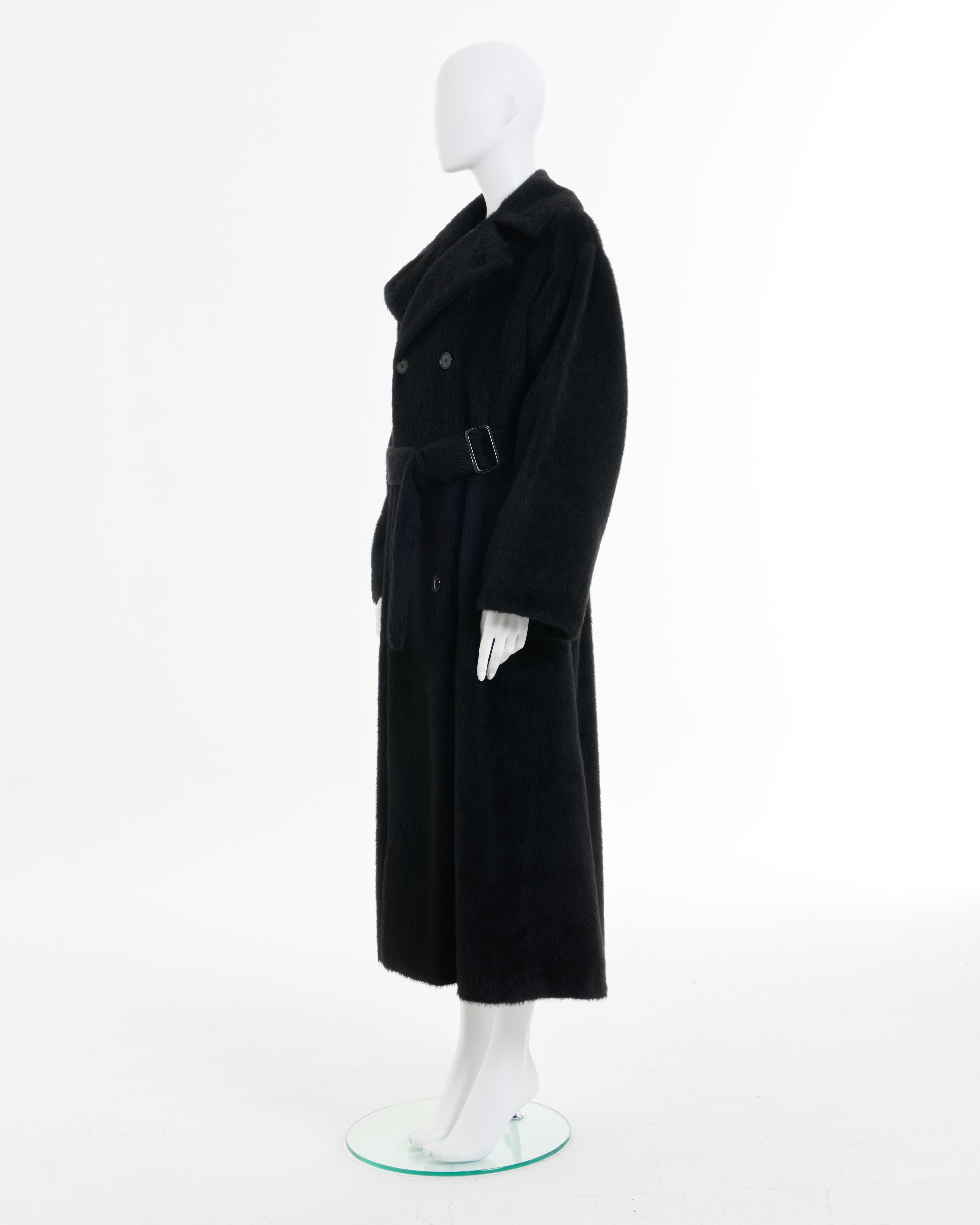 -Designed by Jean Paul Gaultier
- Sold by Skof.Archive
- Black Alpaca Coat
- Double Breasted
- Button Closure
- Belt at the waist
- Comfort fit
- Made in Italy
- Excellent Codition
- Materials: Wool&Alpaca
- Size: FR 36 - IT 40 - UK 8 - US 4 (EU) 