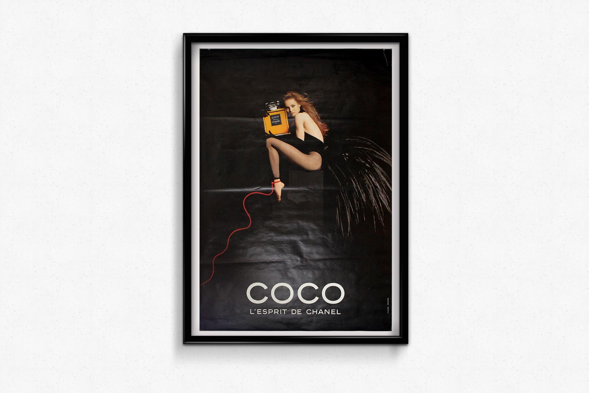 A bold and unforgettable fusion of fashion, fantasy, and femininity, this 1991 original advertising poster for Coco by Chanel is the work of the legendary image-maker Jean-Paul Goude, starring the iconic Vanessa Paradis.

Goude—renowned for his