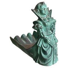 Sculture figurative in metallo