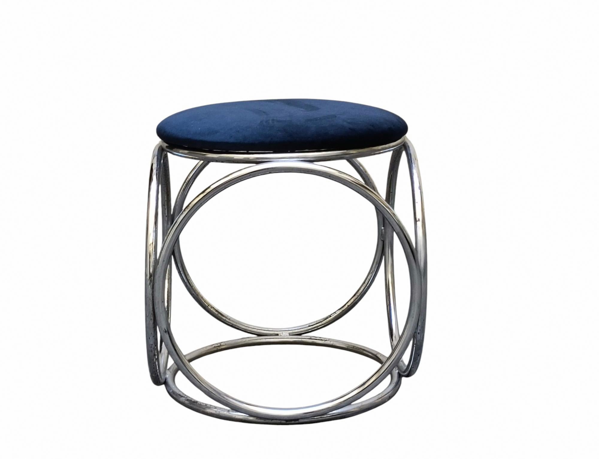 Stool composed of 6 tubular steel hoops  and round seat in blue fabric, attributed to Jean-Pierre Laporte...
Composed of a perforated chrome metal frame with a beautiful round graphic pattern on all four sides, and the  blue fabric seat