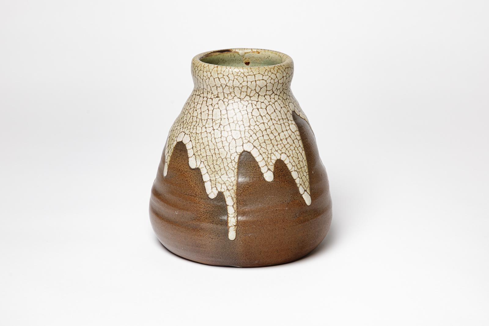 Jean Pointu 


Grande vaso in ceramica art déco del XX secolo di Jean Pointu

Vaso in ceramica marrone e bianco

Firmato

Condizioni originali perfette

Altezza 19 cm
Grande 17 cm

