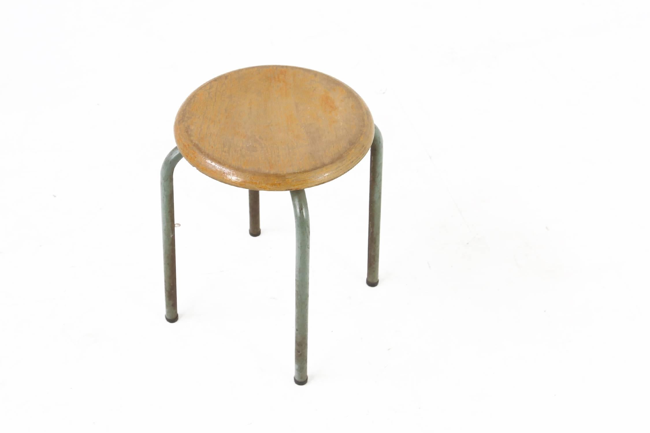 Stool designed by Jean Prouve´, circa 1950s
Lacquered metal base and laminated wood seat.