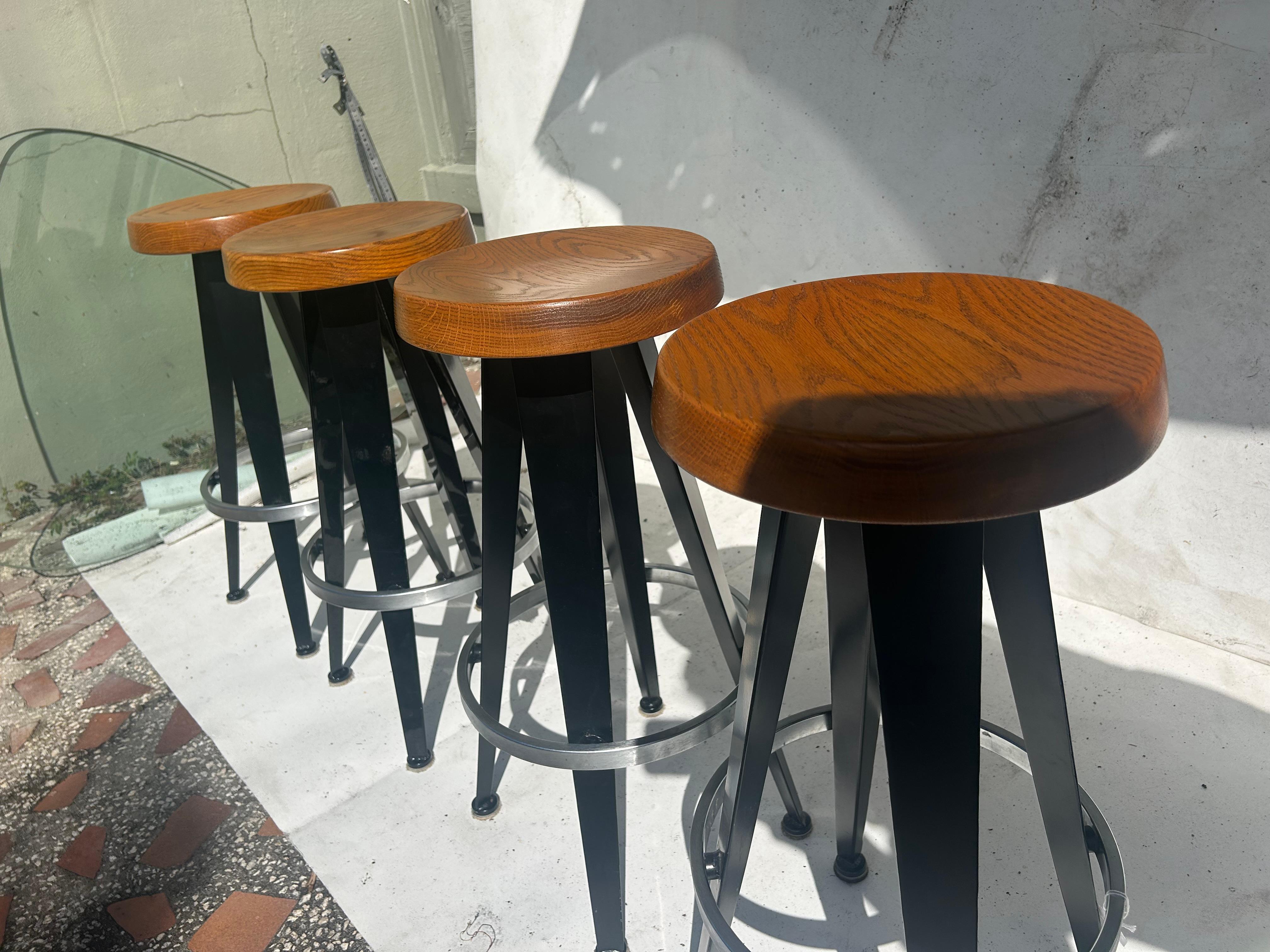 Jean Prouve after. Four modernist barstools. 4