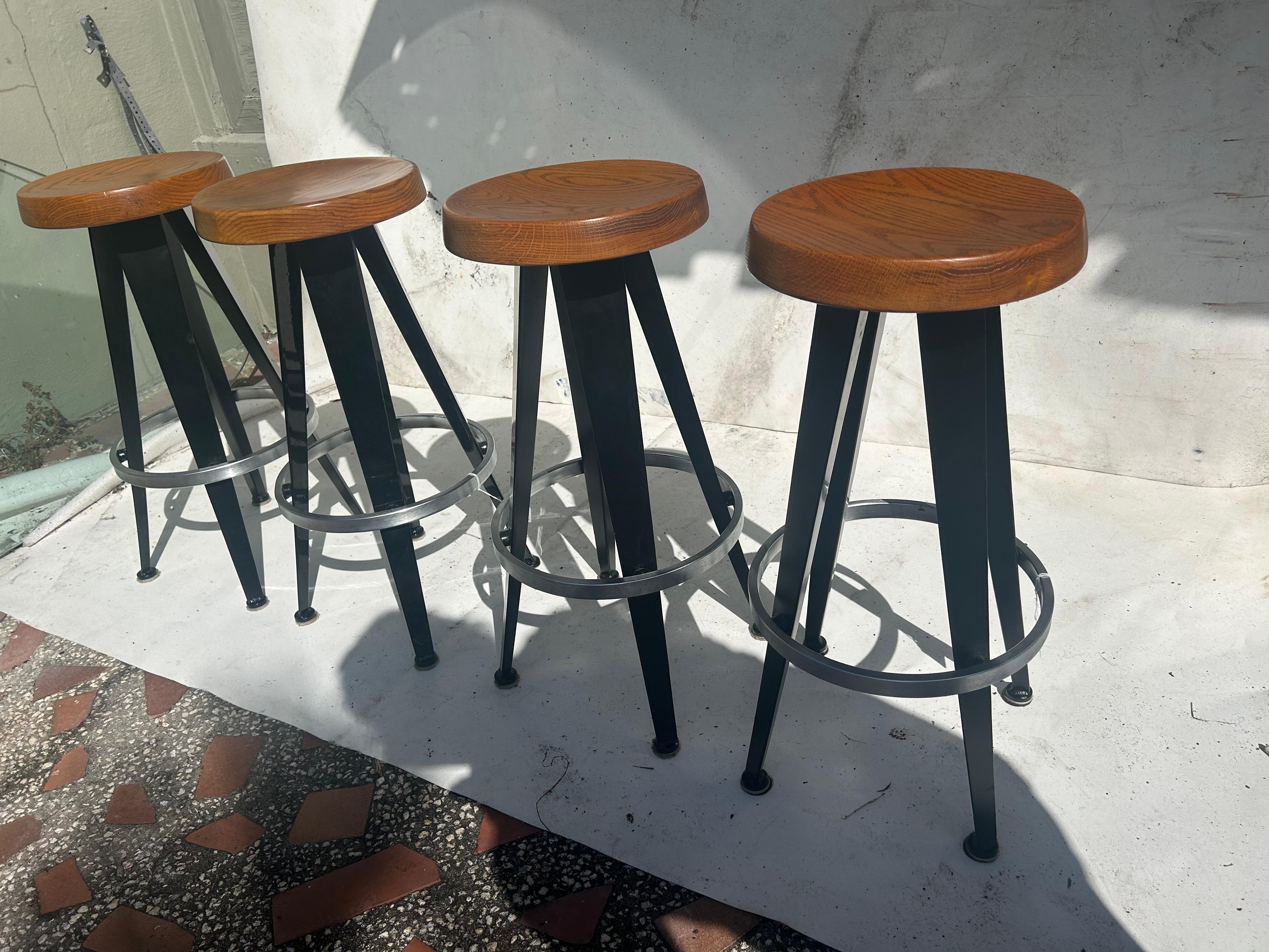 Jean Prouve after. Four modernist barstools. 5