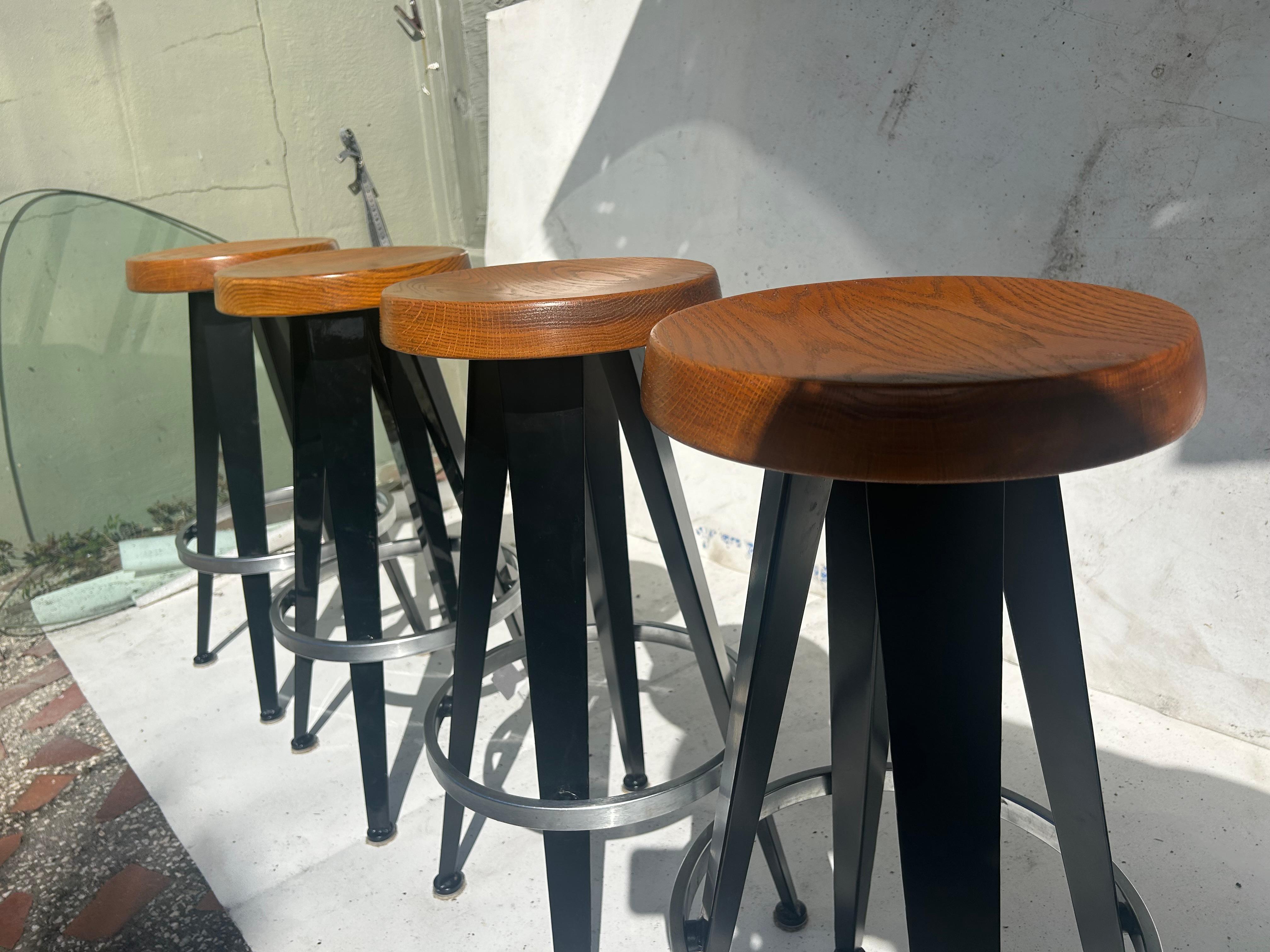 Jean Prouve after. Four modernist barstools. 8