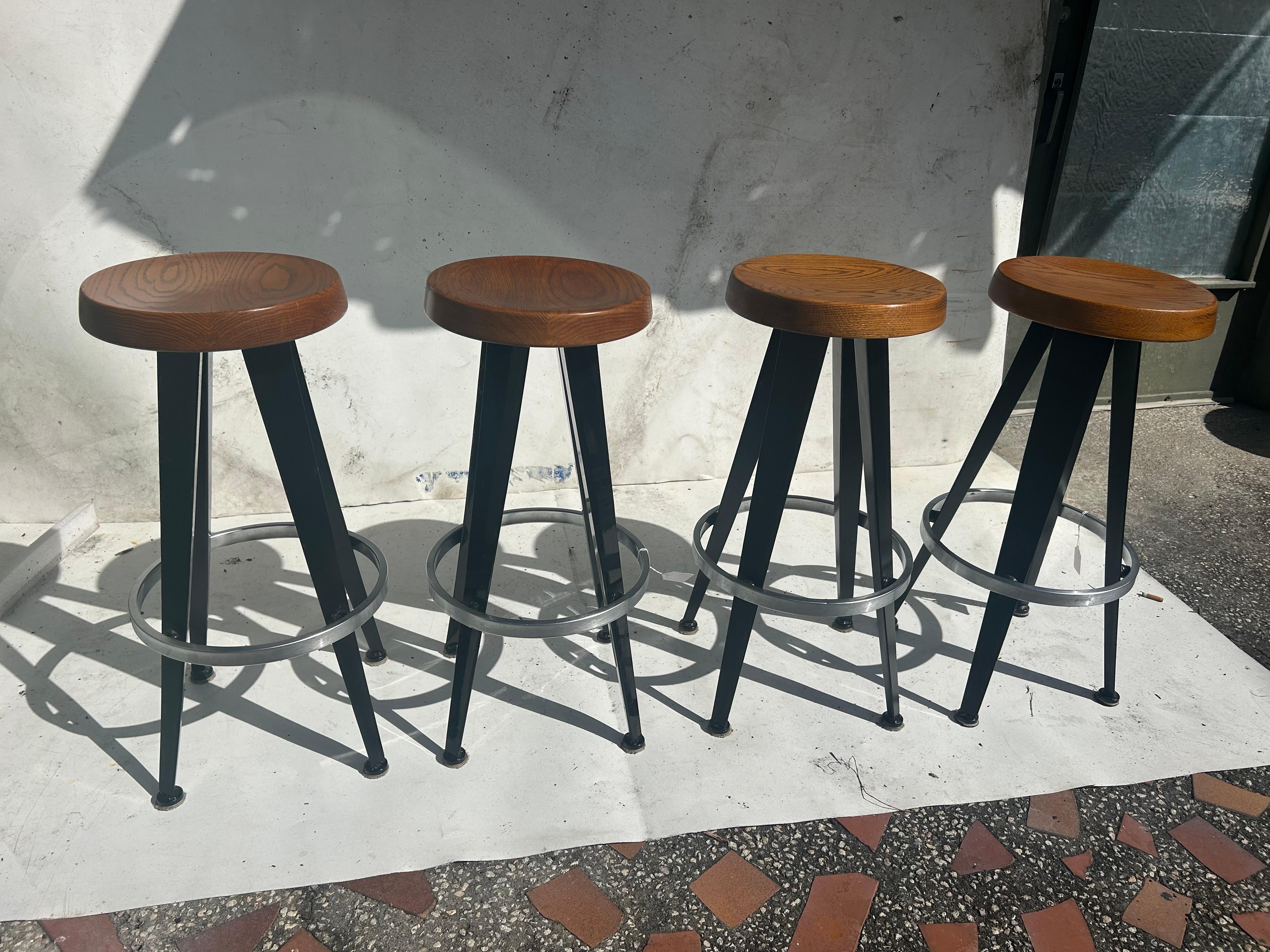 Jean Prouve after. Four modernist barstools. 10