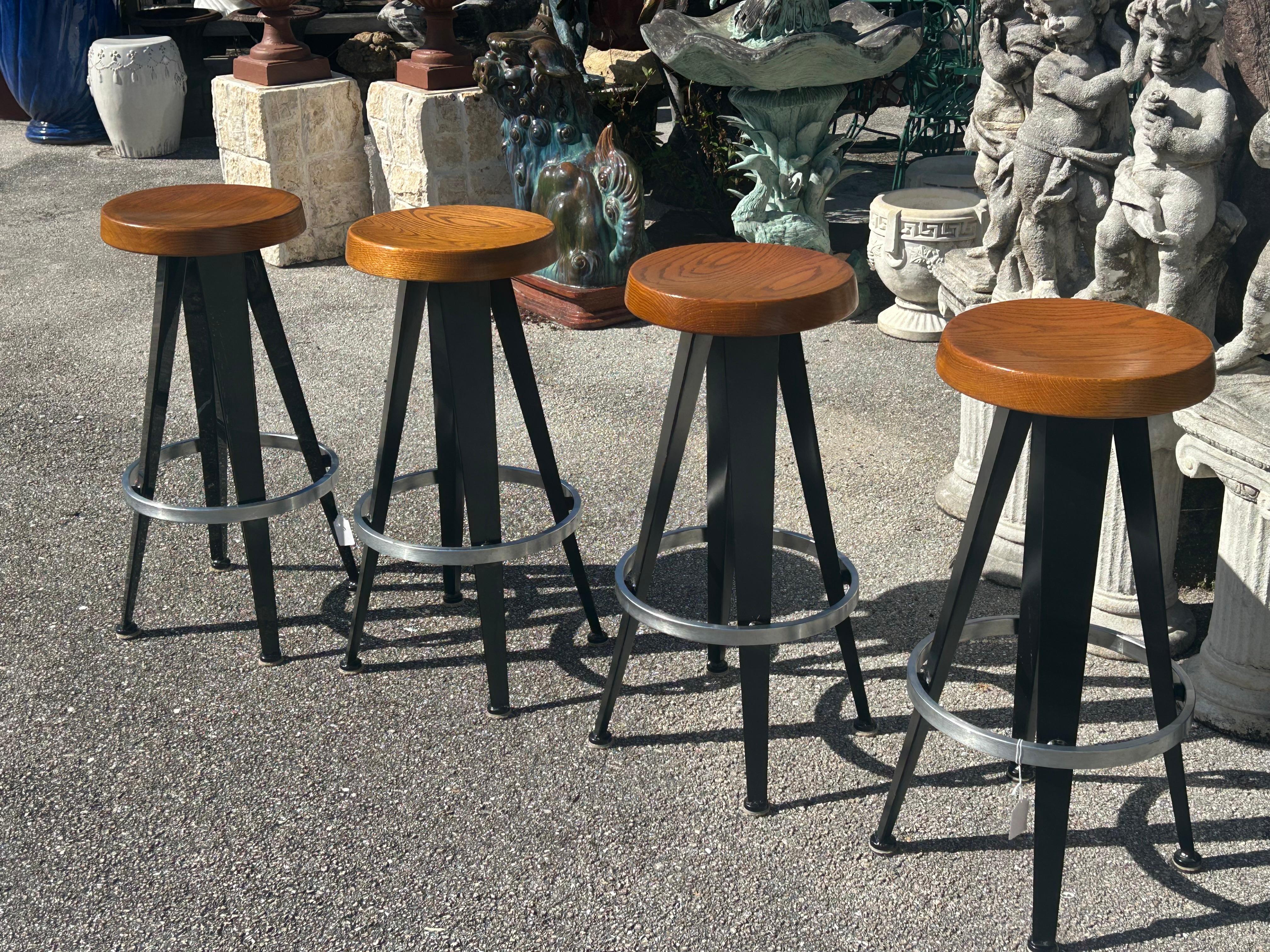 Jean Prouve after. Four modernist barstools. 12