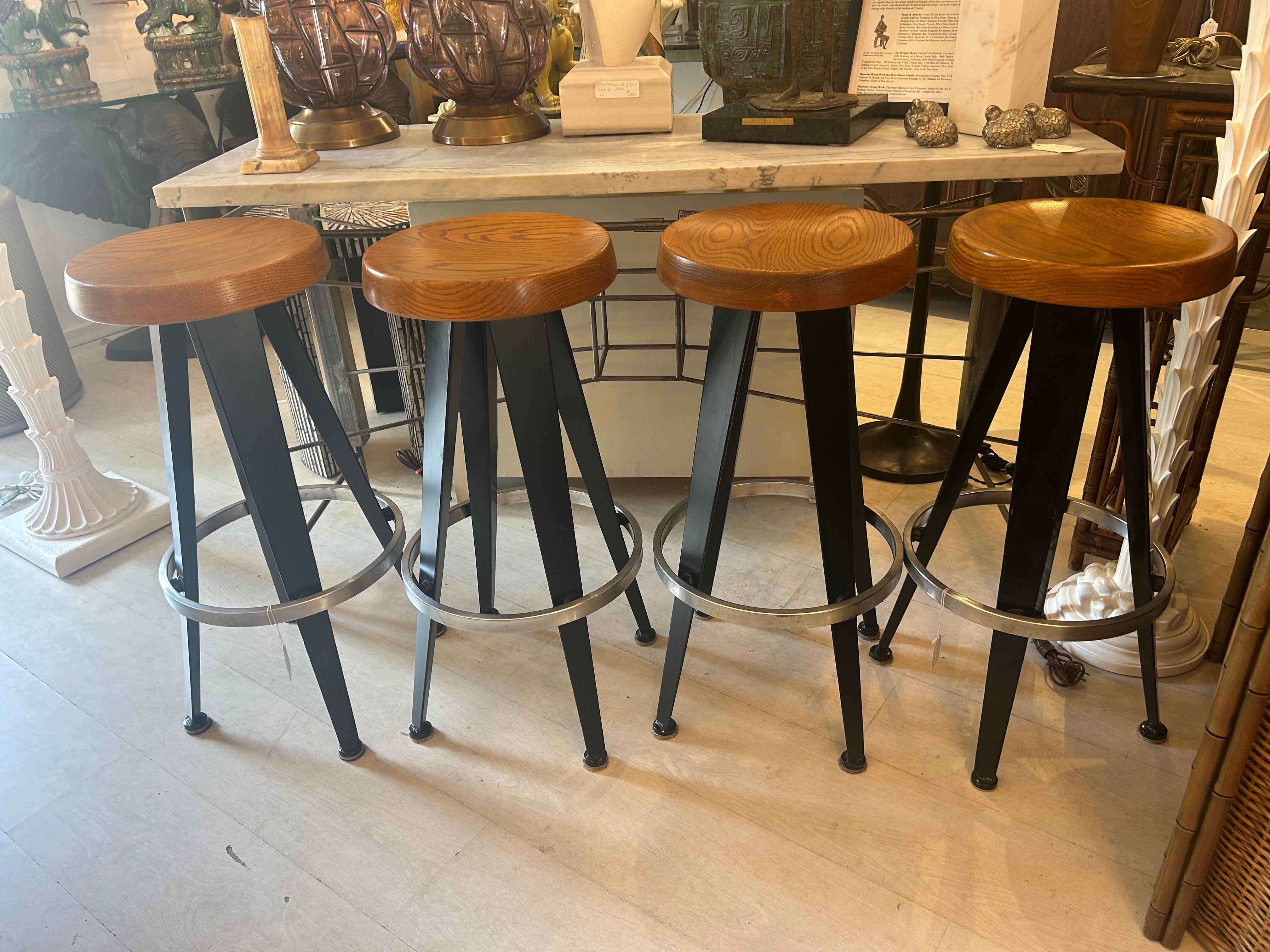Jean Prouve after. Four modernist barstools. 13