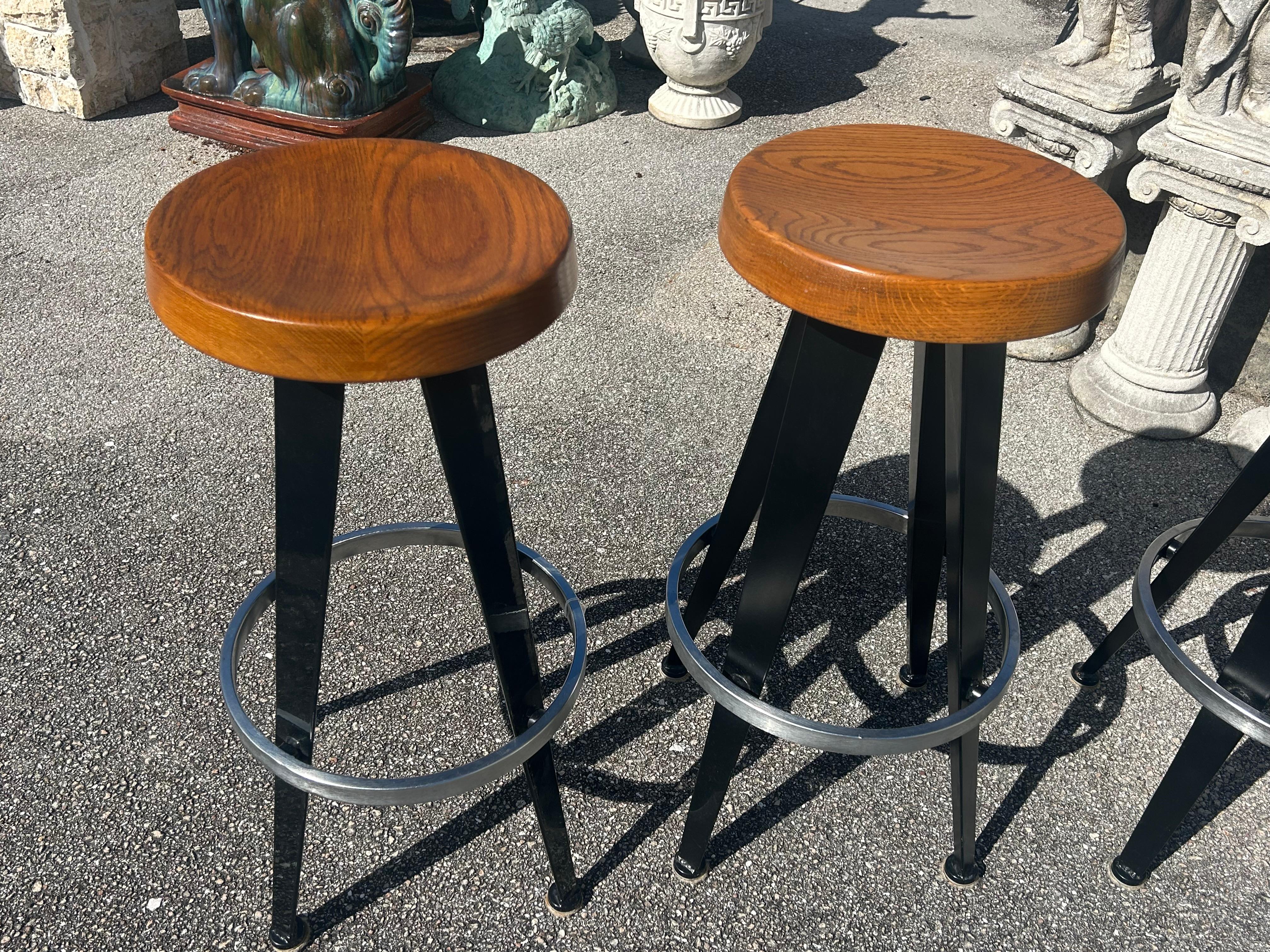 Modern Jean Prouve after. Four modernist barstools.