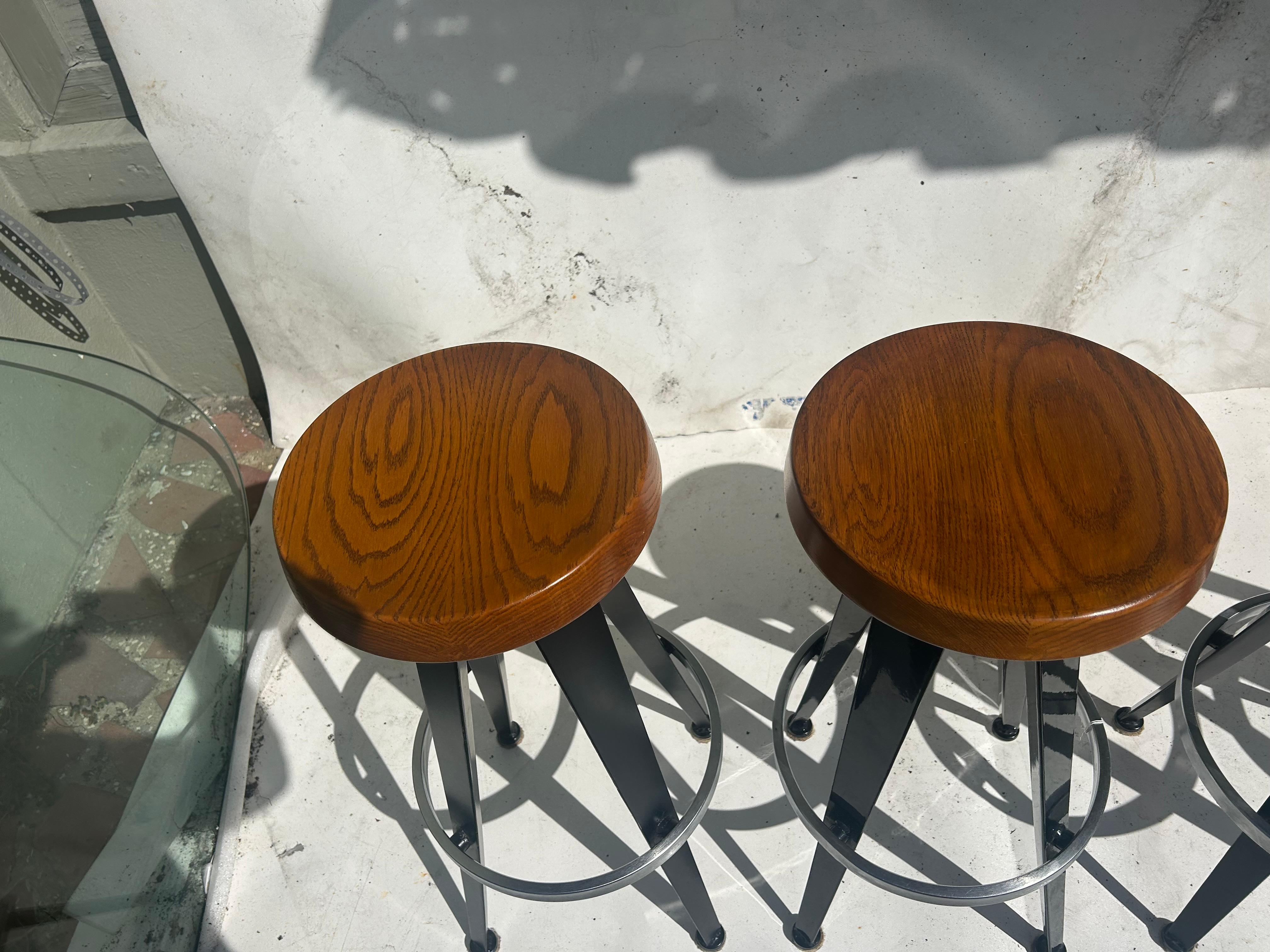 Jean Prouve after. Four modernist barstools. 3