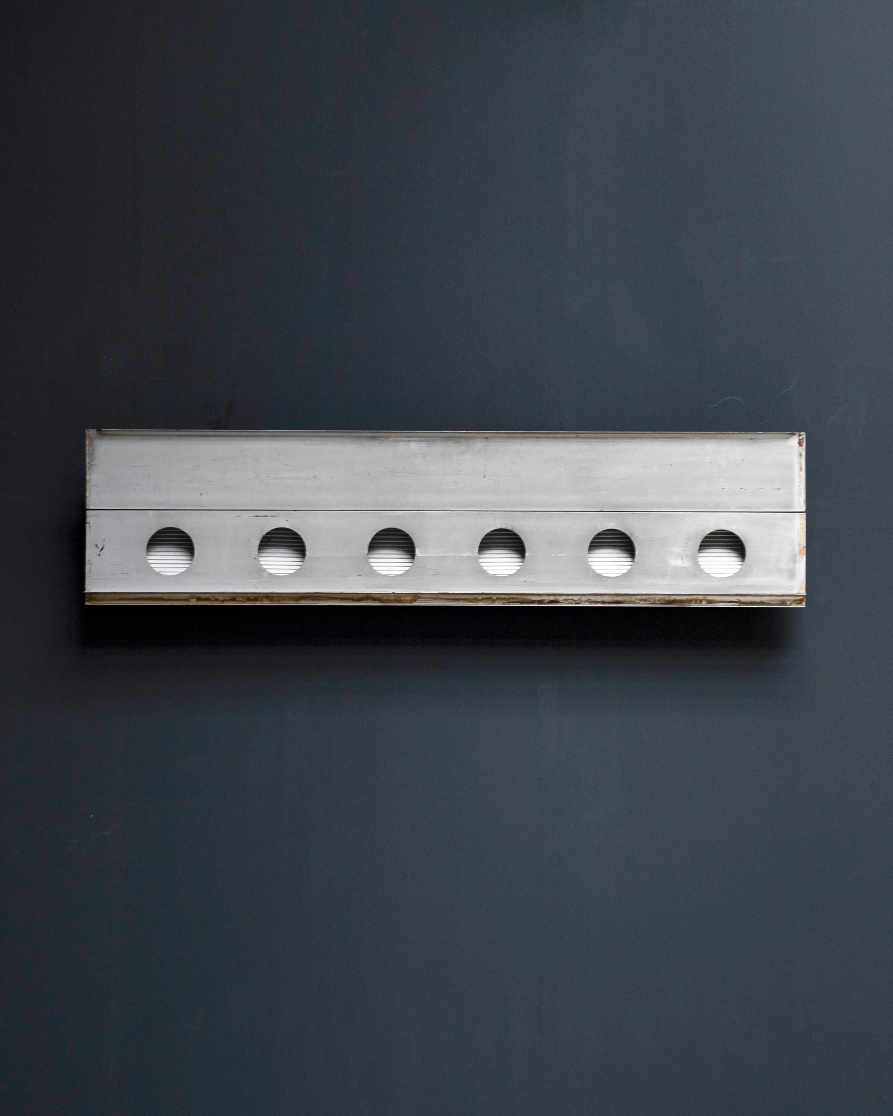 Aluminum fragment by Jean Prouvé,
circa 1958 
Provenance: Bagnols-sur-Cèze.