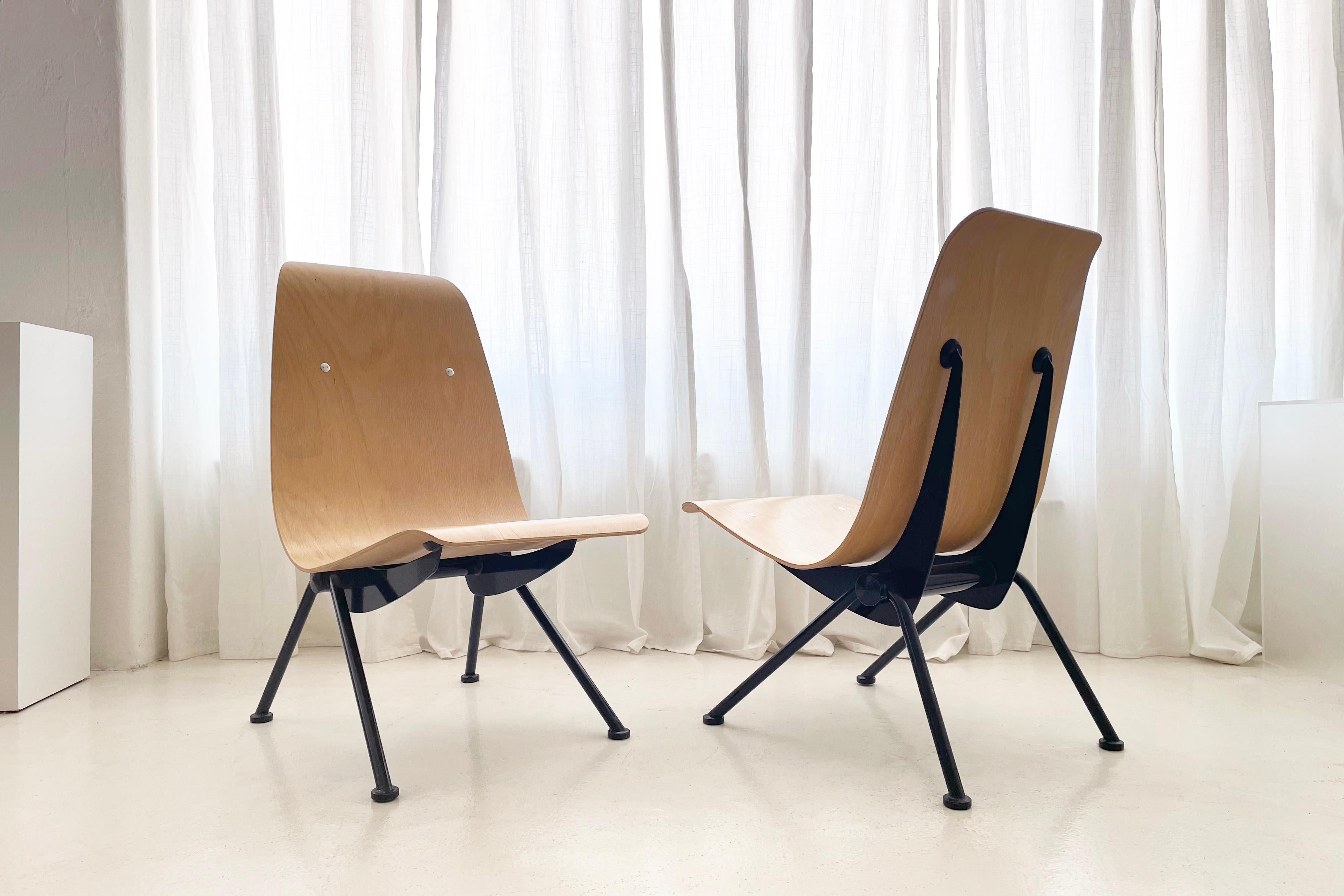 These chairs are a very sought after set of Antony Chairs originally designed in 1950 by French Architect Jean Prouvé, released via license by Vitra USA on behalf of the Prouvé family in 2002.

The chairs were re-released in a limited number and are