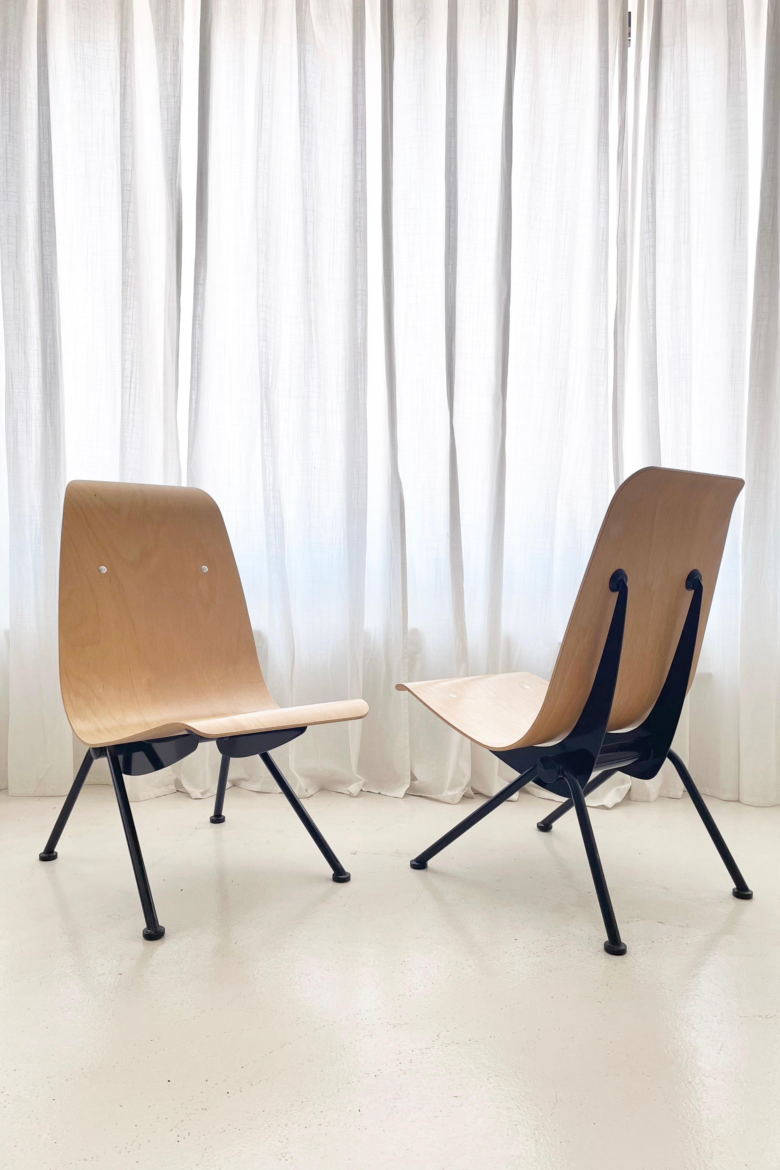 These chairs are a very sought after set of Antony Chairs originally designed in 1950 by French Architect Jean Prouvé, released via license by Vitra USA on behalf of the Prouvé family in 2002.

The chairs were re-released in a limited number and are