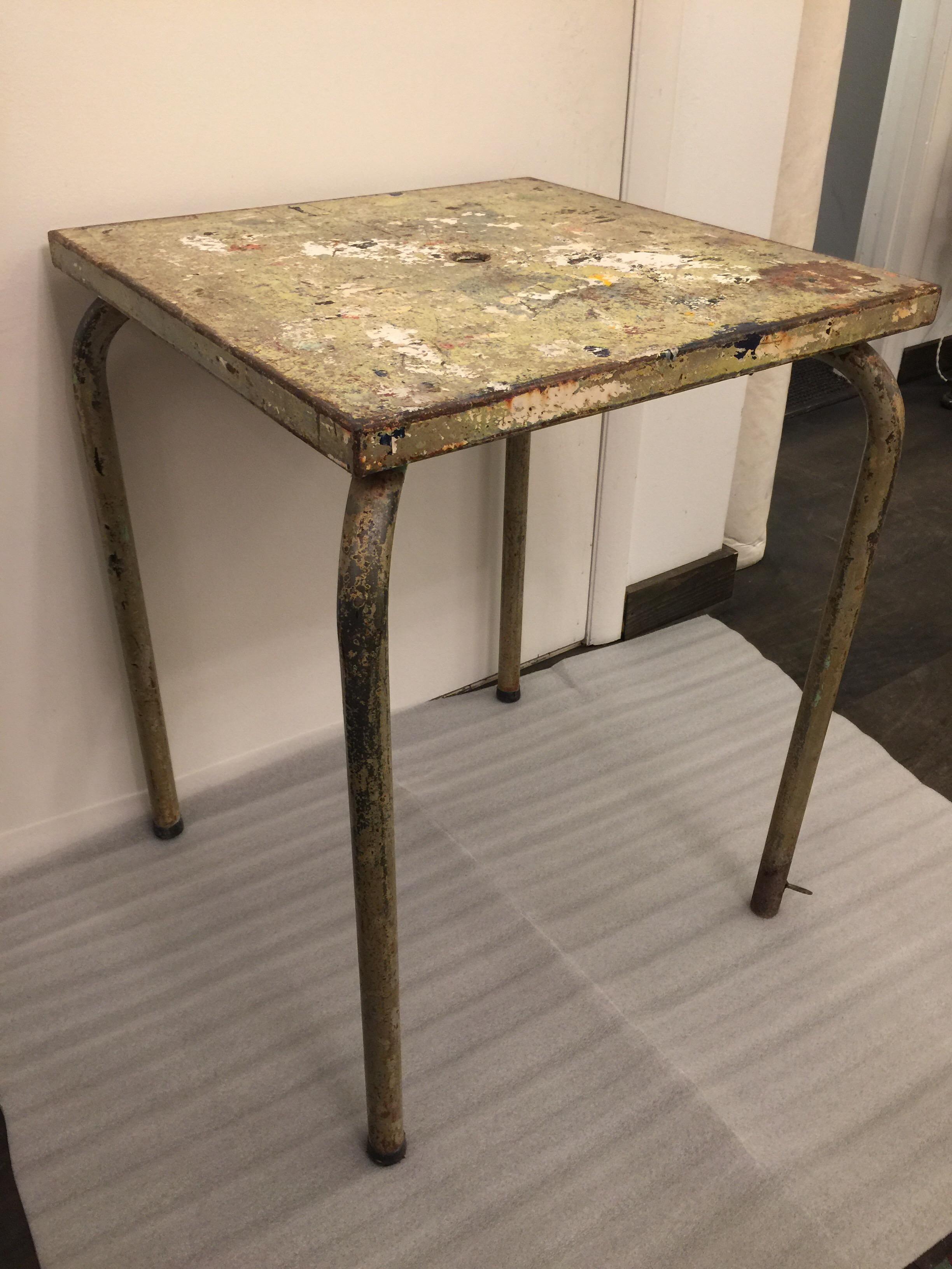 Beautifully distressed through the years of being outside and earning a rich patina. This Jean Prouvé attributed table reminds me of Jackson Pollock painting. This table will make a great side table or game table, just stunning!

   