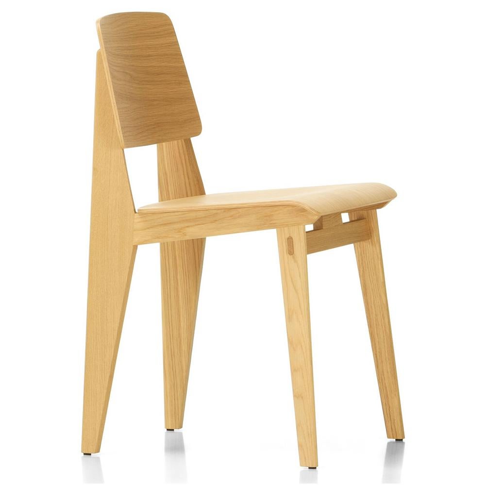 Jean Prouvé 'Chaise Tout Bois' chair in natural oak for Vitra. Originally designed in 1941, Chaise Tout Bois is the only chair by the French 'constructeur' and designer Jean Prouvé that is made entirely out of wood. The design is very similar to