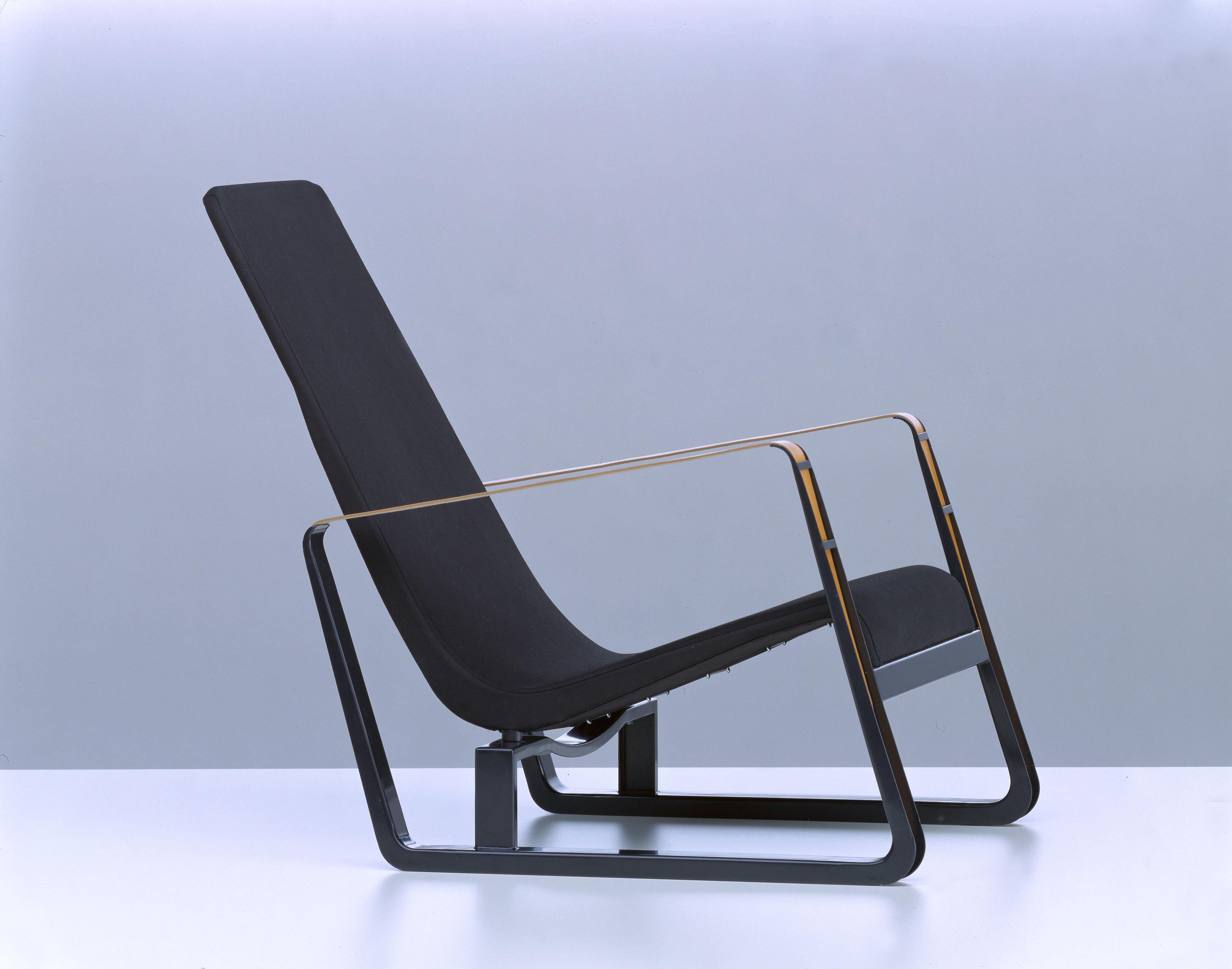 Jean Prouvé Cité chair in black for Vitra. The Cité armchair is an early masterpiece by the French designer and engineer Jean Prouvé. Originally designed in 1930 to furnish the student residence halls at the Cité Universitaire in Nancy, Prouvé also