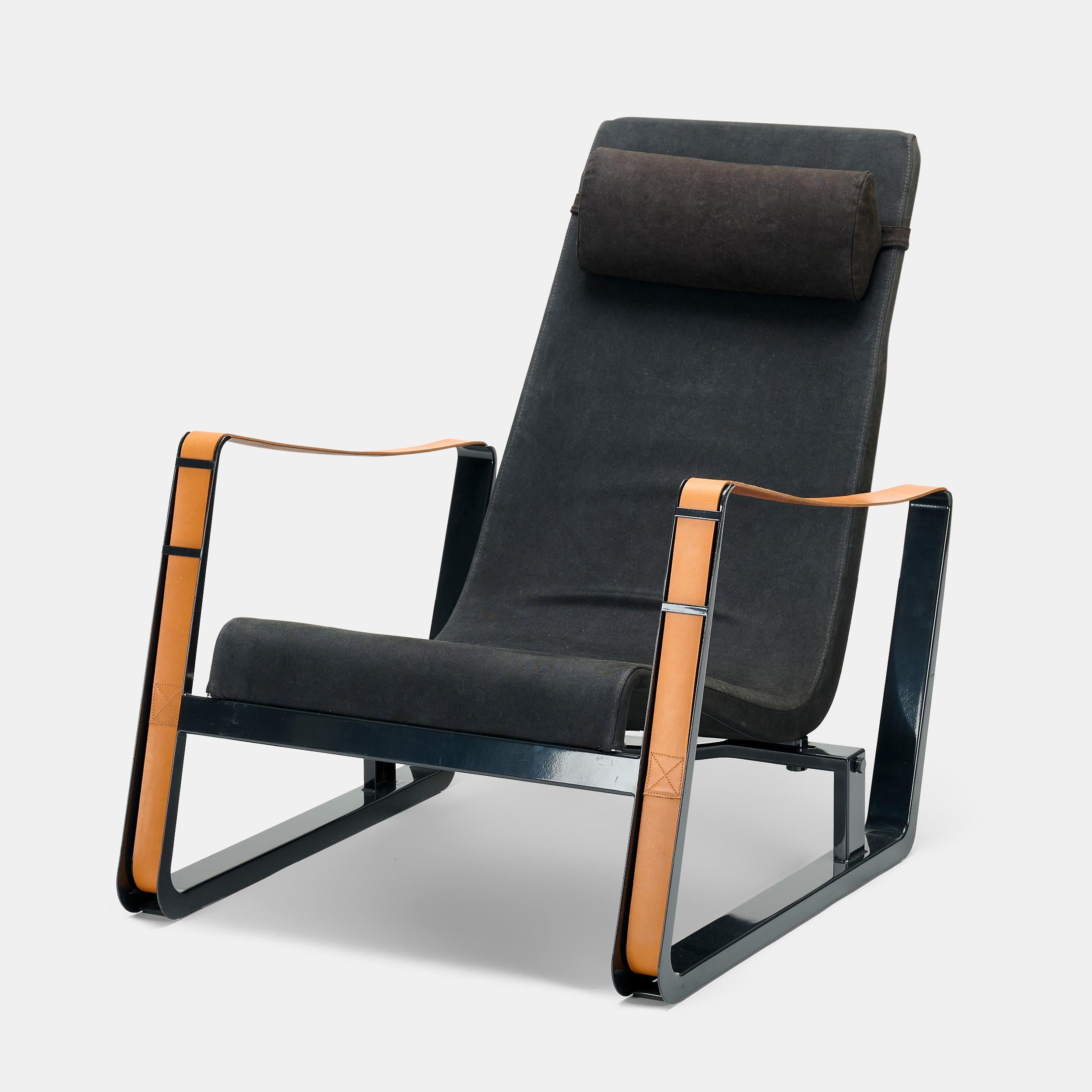 Jean Prouve “Cite” lounge chair for Vitra Germany, 2007.

Dimensions: 33” h x 26 3/4” w x 37 1/2” d

Materials: enameled steel, natural leather, upholstery.

Condition: Good with slight wear from age and use. Structurally sound and ready for use.