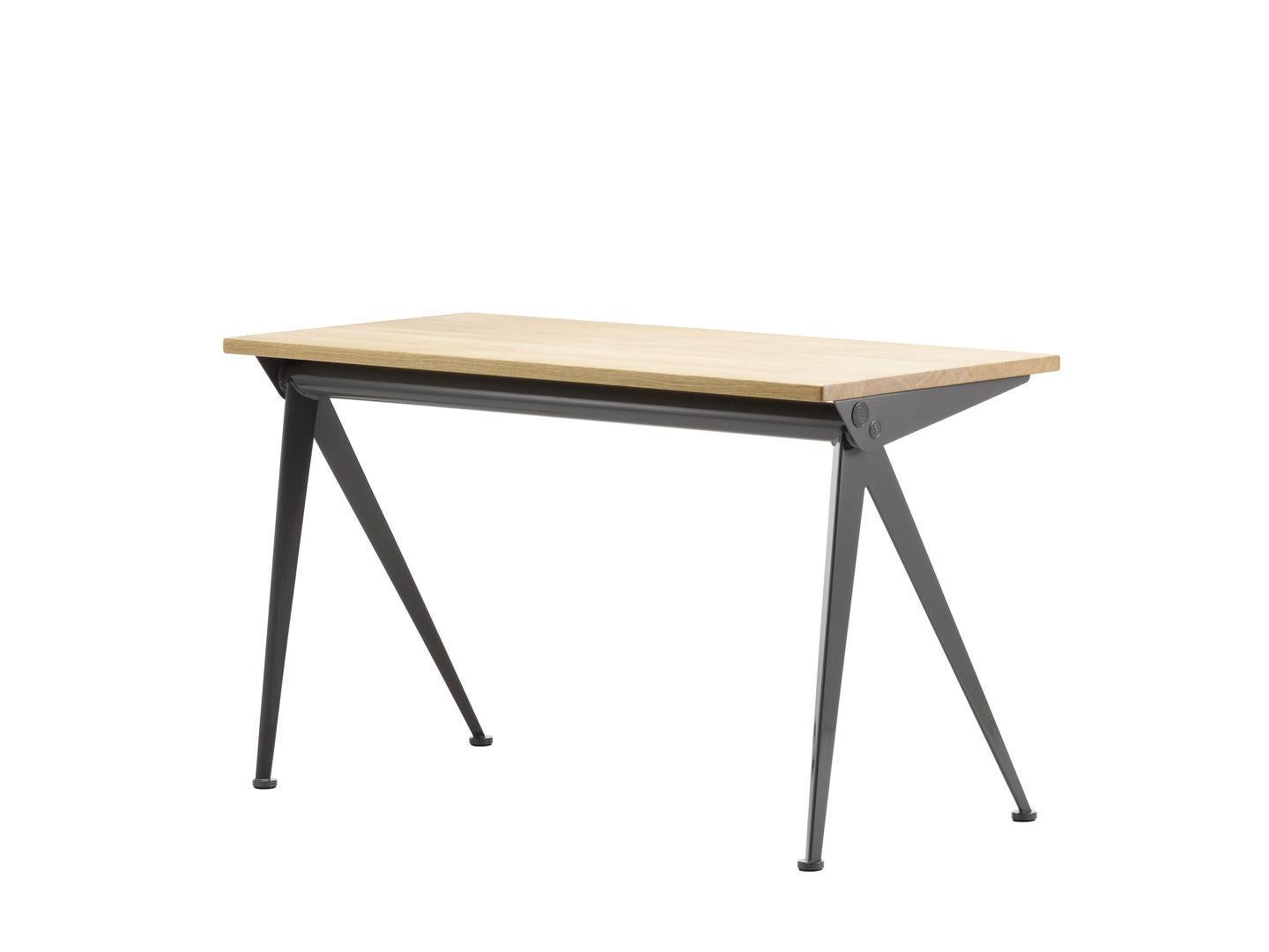 Desk designed by Jean Prouvé in 1953.
Manufactured by Vitra, Switzerland.

The slender, elegantly splayed metal legs of the Compas Direction desk by Jean Prouvé call to mind the hinged arms of a compass – ‘le compas’ in French. Their design is