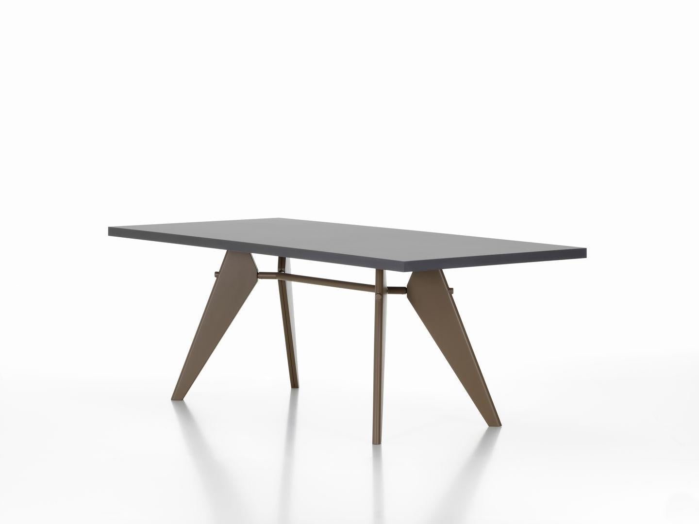 Table designed by Jean Prouvé in 1950.
Manufactured by Vitra, Switzerland.

The aesthetic appearance of Jean Prouvé's EM Table adheres to structural principles, illustrating the flow of forces and stresses in its construction. The designer and