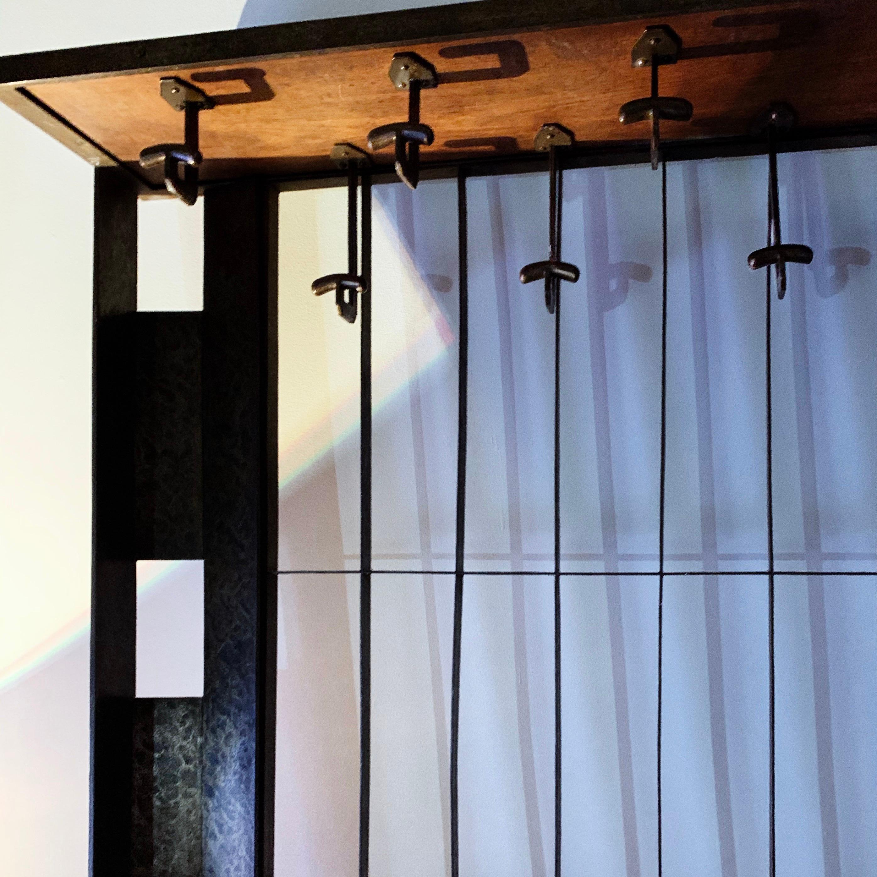 Jean Prouvé French Deco coat rack, modern floor mirror & screen, Brazil, 1930s; One-of-a-kind custom piece by the French master.   

Jean Prouvé believed in design as a vehicle for improvement. Collectors connect with his utilitarian, austere