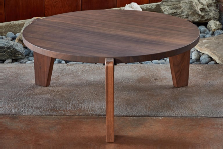 Jean Prouvé guéridon bas coffee table in walnut for Vitra. In like new condition. Executed in solid American walnut. Retains manufacturer's label and certificate of authenticity. 

Designed in 1944, the guéridon bas is an early masterpiece by the