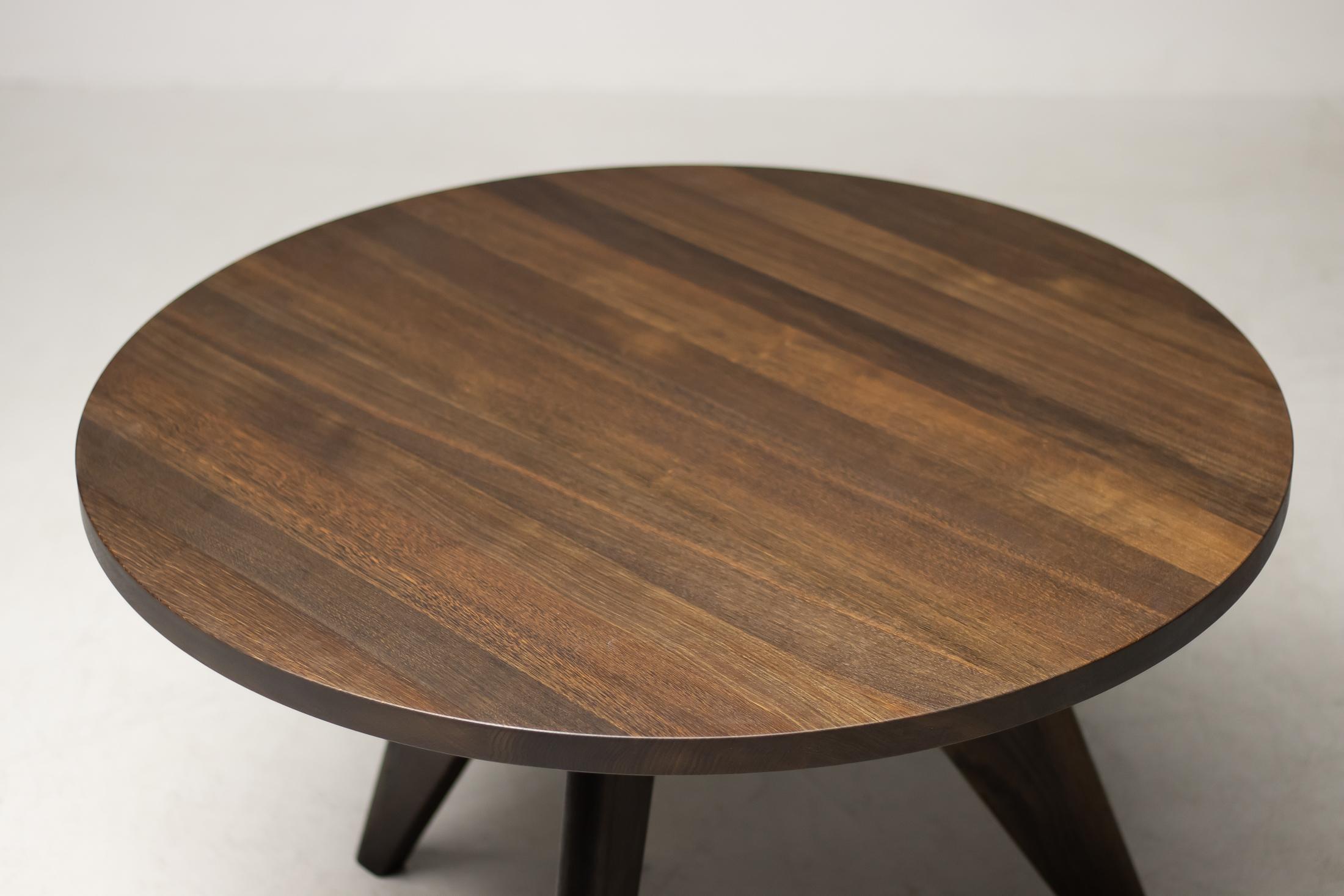 Smoked solid oak Guéridon dining table designed by Jean Prouvé for Vitra.
Marked with label.


 