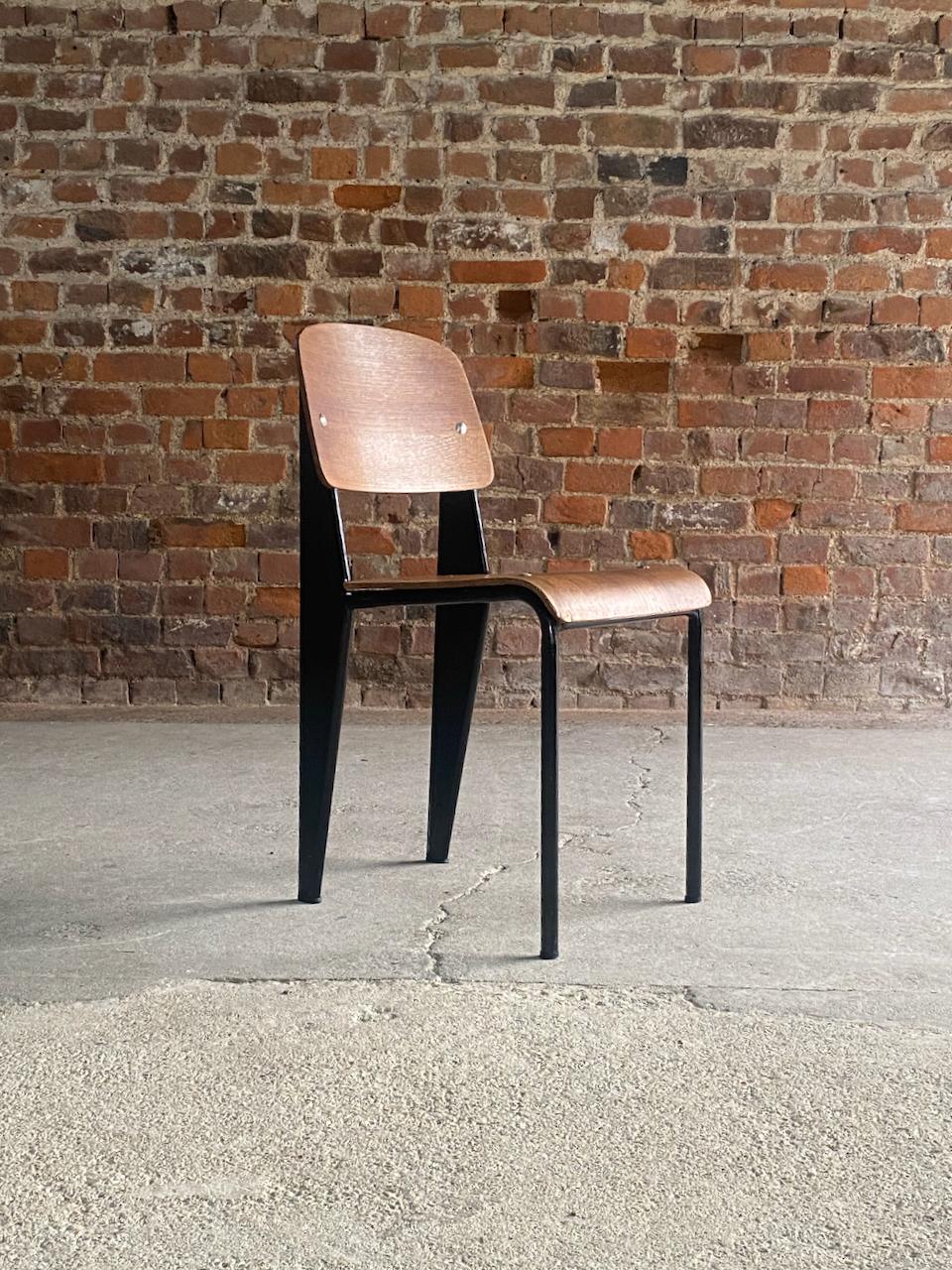 Jean Prouvé Model 305 Black Standard Chair by Atelier Prouvé Circa 1950

Rare and important mid century Jean Prouvé Model 305 Black Standard Chair by Atelier Prouve Circa 1950, in lacquered semi steel and plywood, chair in original condition,