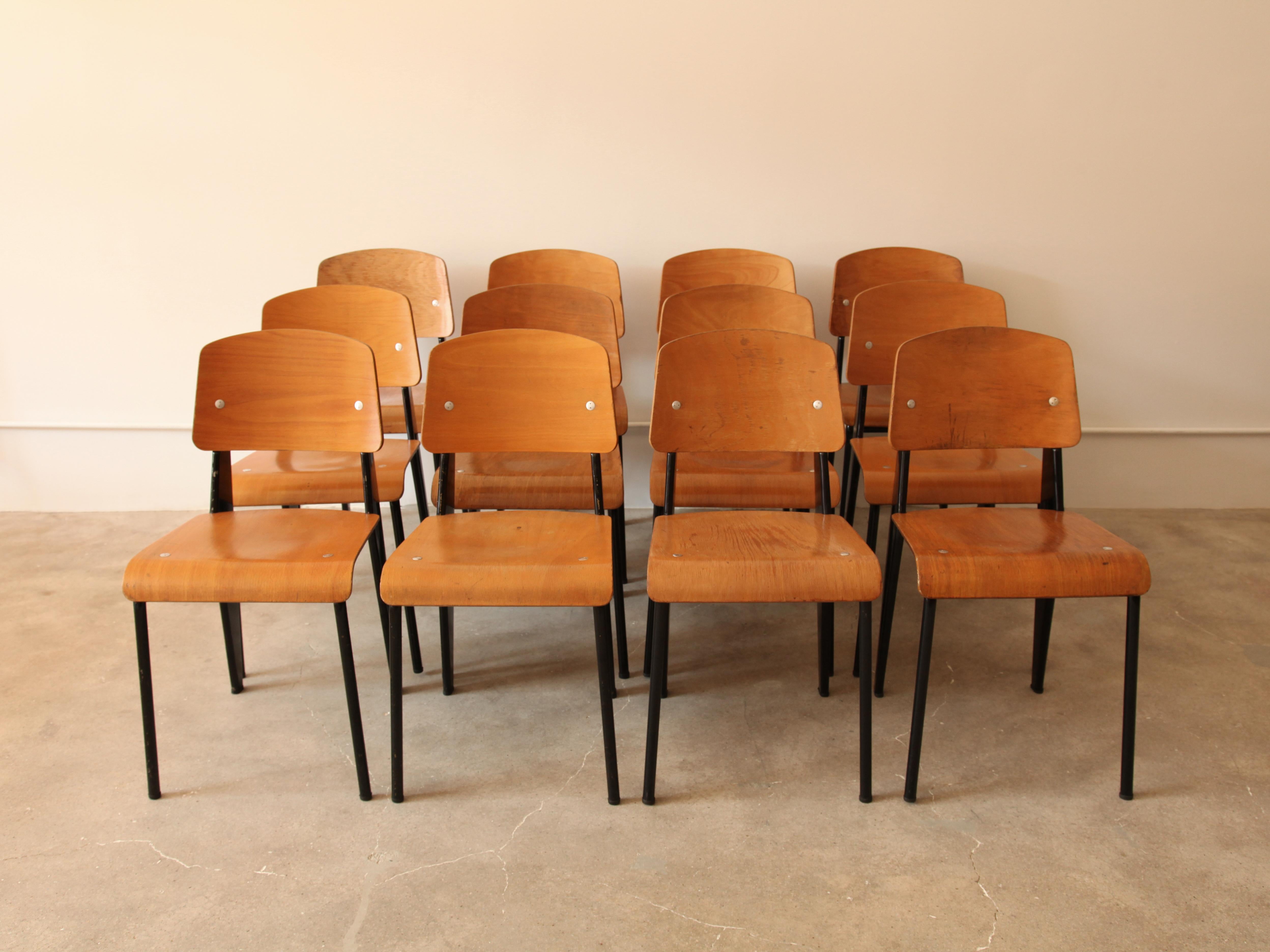 'Semi-Metal' No. 305 chairs by Jean Prouve, and manufactured by Ateliers Jean Prouvé, France, circa 1950. Enameled steel and beech plywood.  We currently have a set of 8 available. 

Price is per chair. 

Please contact for more info.

Ref: Jean
