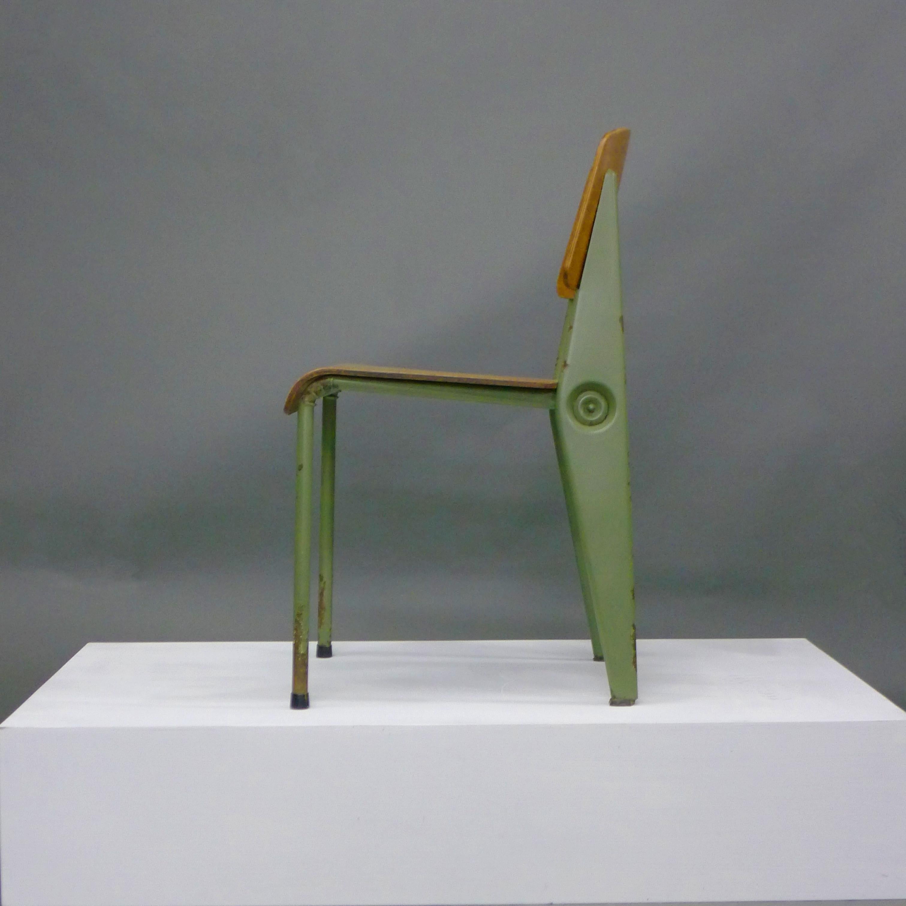 Jean Prouvé (1901-1984)
Rare 'Démontable' Chair, Model No. 300, circa 1950-2
manufactured by Atelier Jean Prouvé, Nancy, France
birch plywood, folded steel sheet and tube enamelled in an attractive fern green
81cm high, 40cm wide, 47cm deep, seat