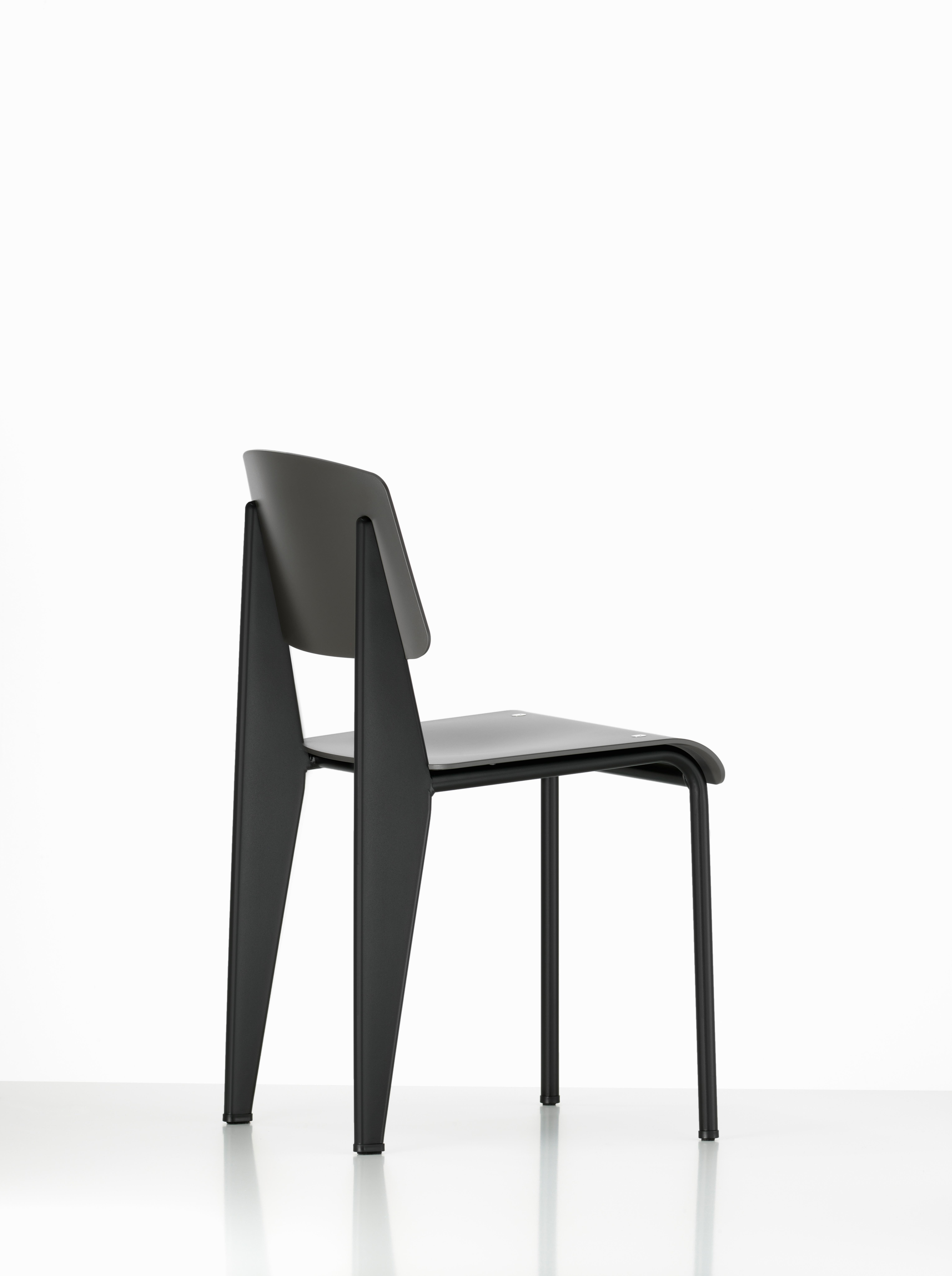 Jean Prouvé standard chair SP in black for Vitra. The standard SP chair is a modernized variation on an early masterpiece by the French designer and engineer Jean Prouvé. Originally designed in 1934, the Standard evolved into one of the most famous