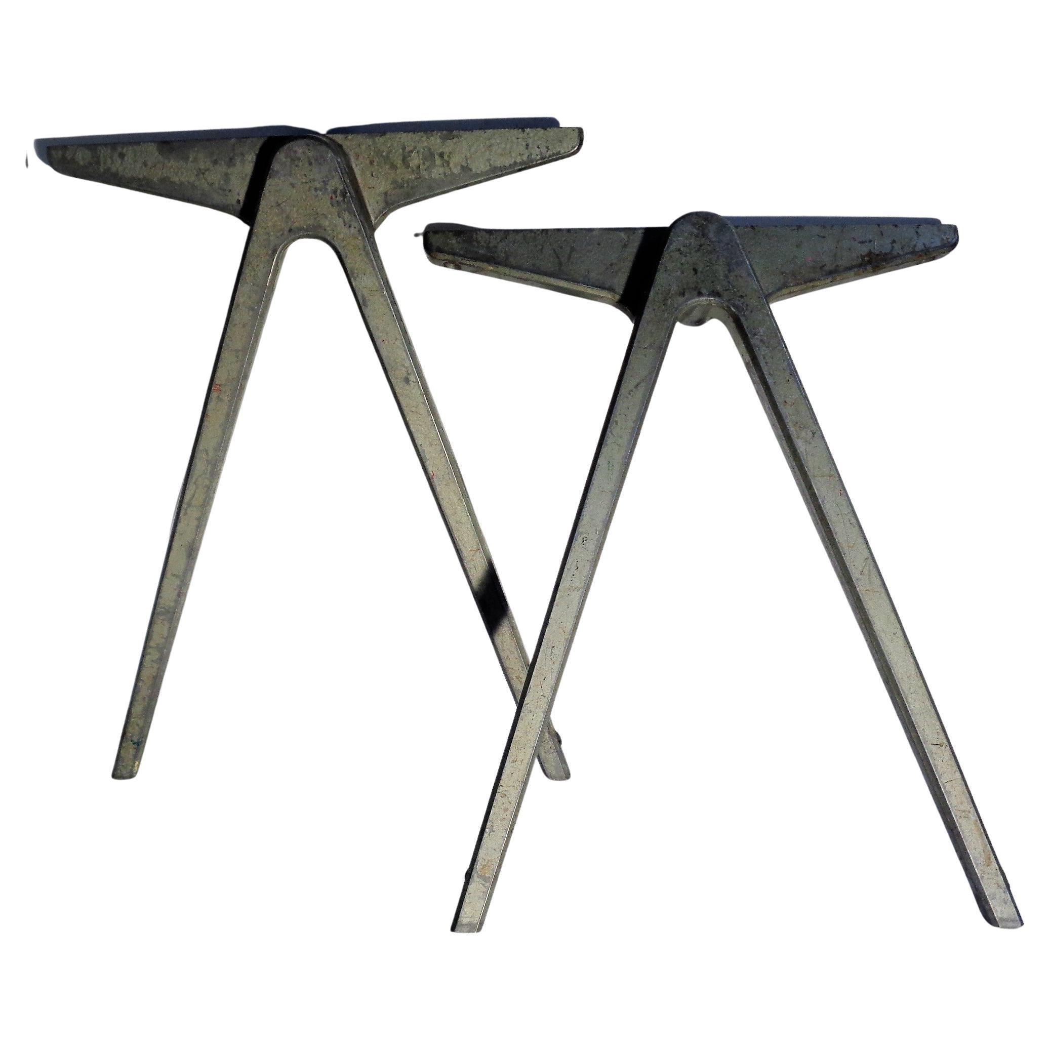 Pair of early industrial modernist aluminum compass form table legs / table end bases in the style of Jean Prouve' by James Leonard for Esavian, England 1940. This earlier compass design by James Leonard for Esavian preceded the Prouve' compass