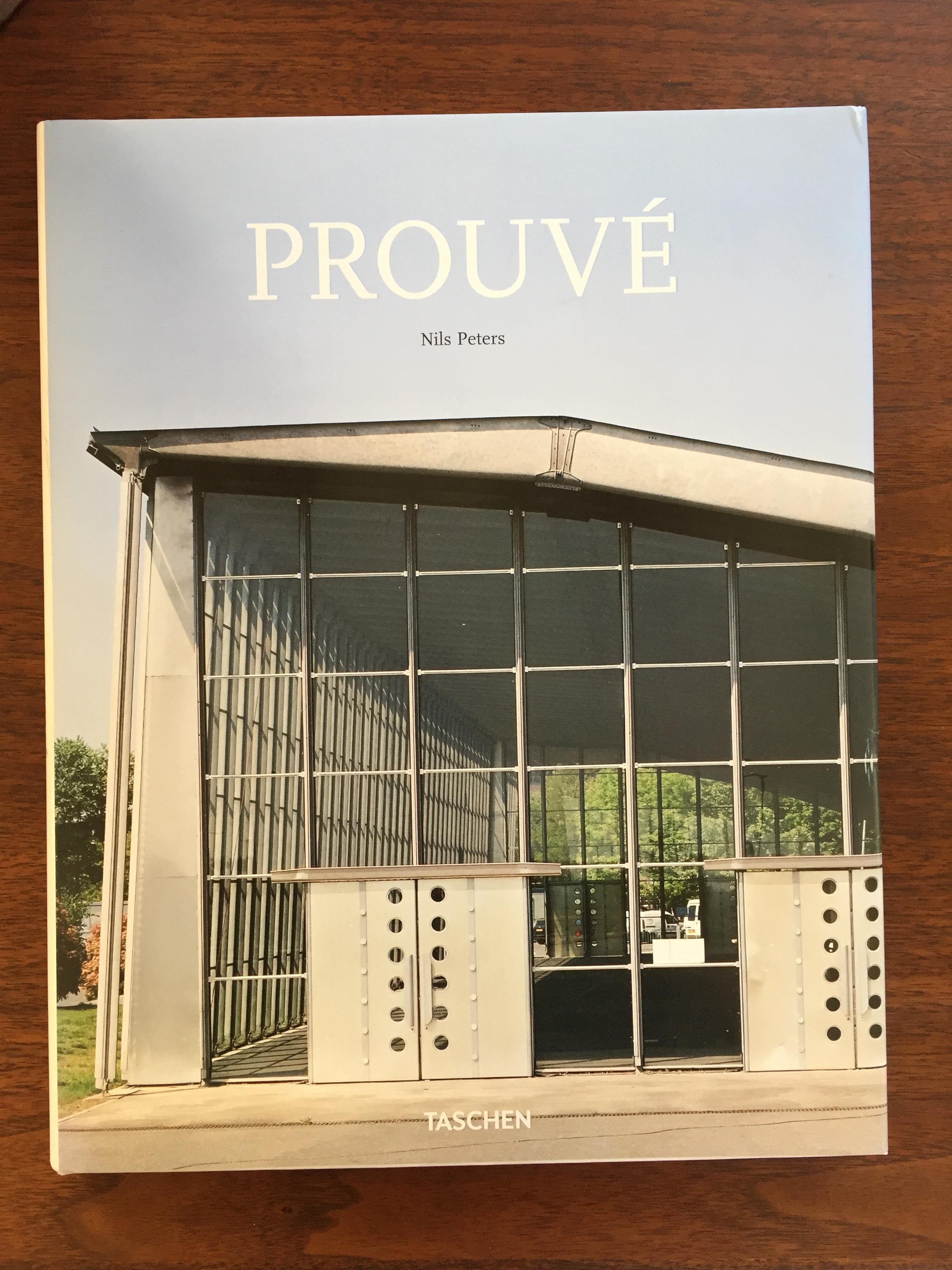 PROUVÉ Taschen book, 96 pages by Nils Peters. 
Celebrate the man, the myth, the legendary artistic blacksmith, designer and manufacturer.
French architect and designer Jean Prouvé innovated crisp, economical construction designs, marrying