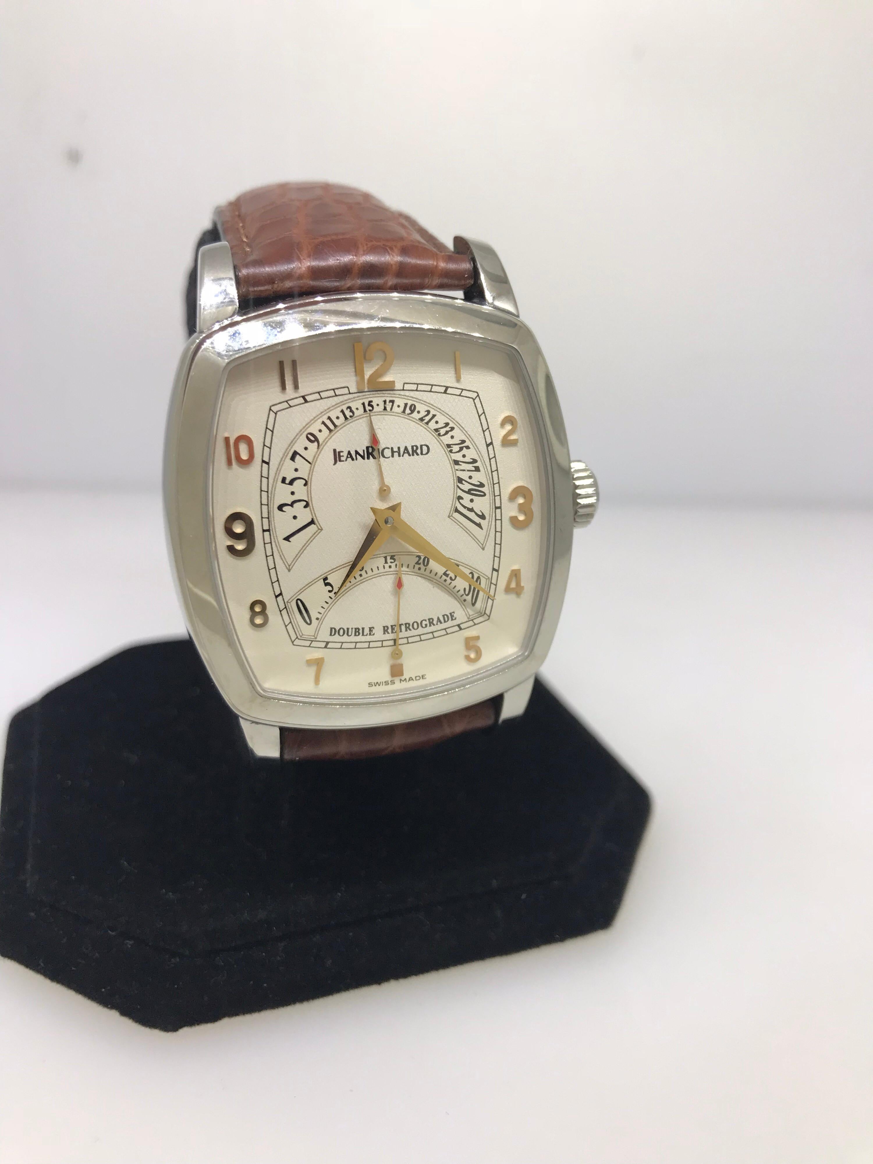 Jean Richard TV Screen Men's Watch

Model Number: JR-23116-11-10A-AAED

100% Authentic

New / Old Stock

Comes with a generic watch box

Stainless Steel Case & Buckle

White Dial

Case Diameter: 41mm

Brown Leather Band

Deployment Buckle