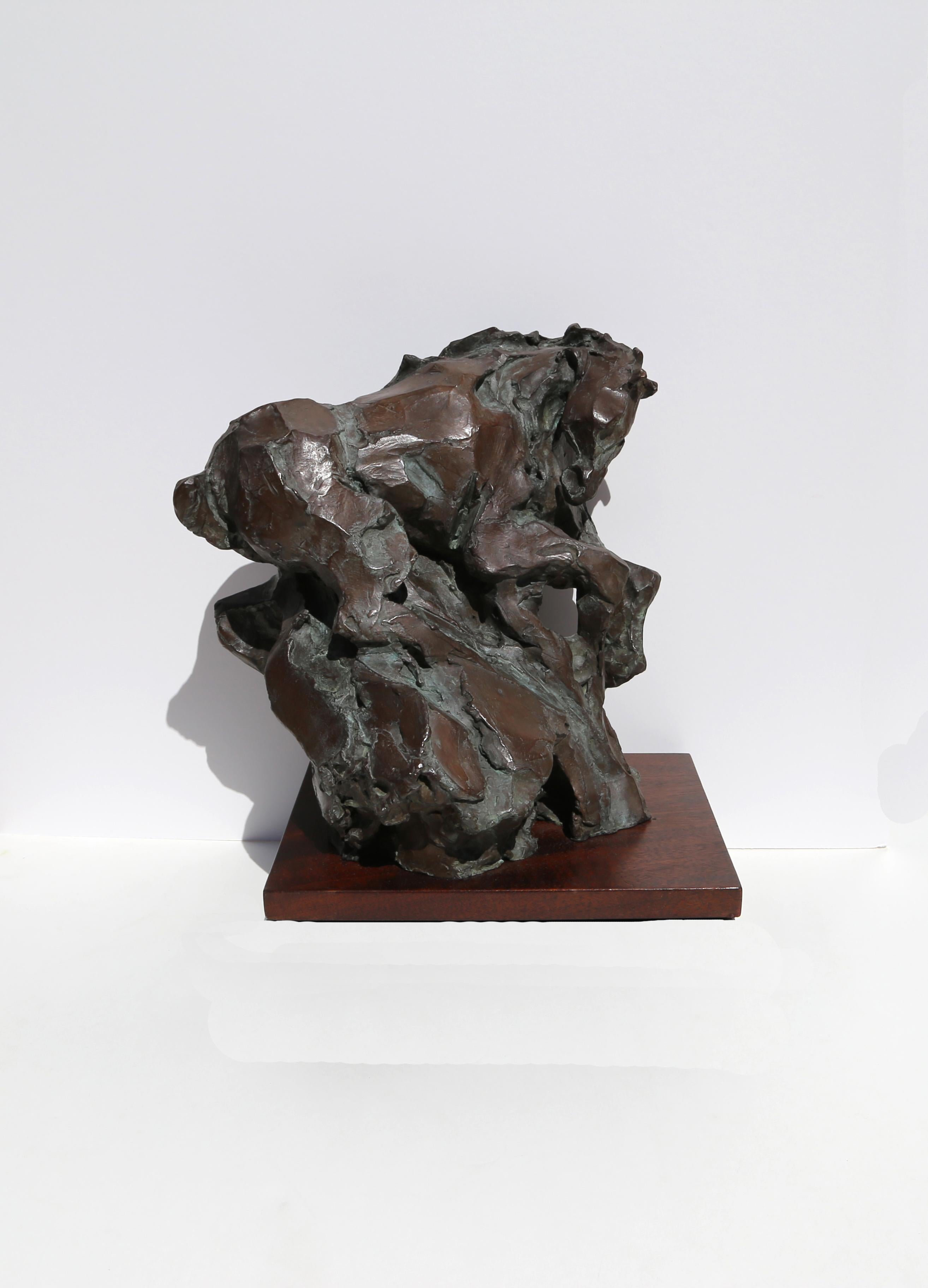 Artist: Jean Richardson, American (1940 -  )
Title: Genesis
Year: 1989
Medium:	Bronze Sculpture, signature and numbering inscribed
Edition: 50
Size: 16 x 15.5 x 12 inches
Base: 1.5 x 14 x 11 inches