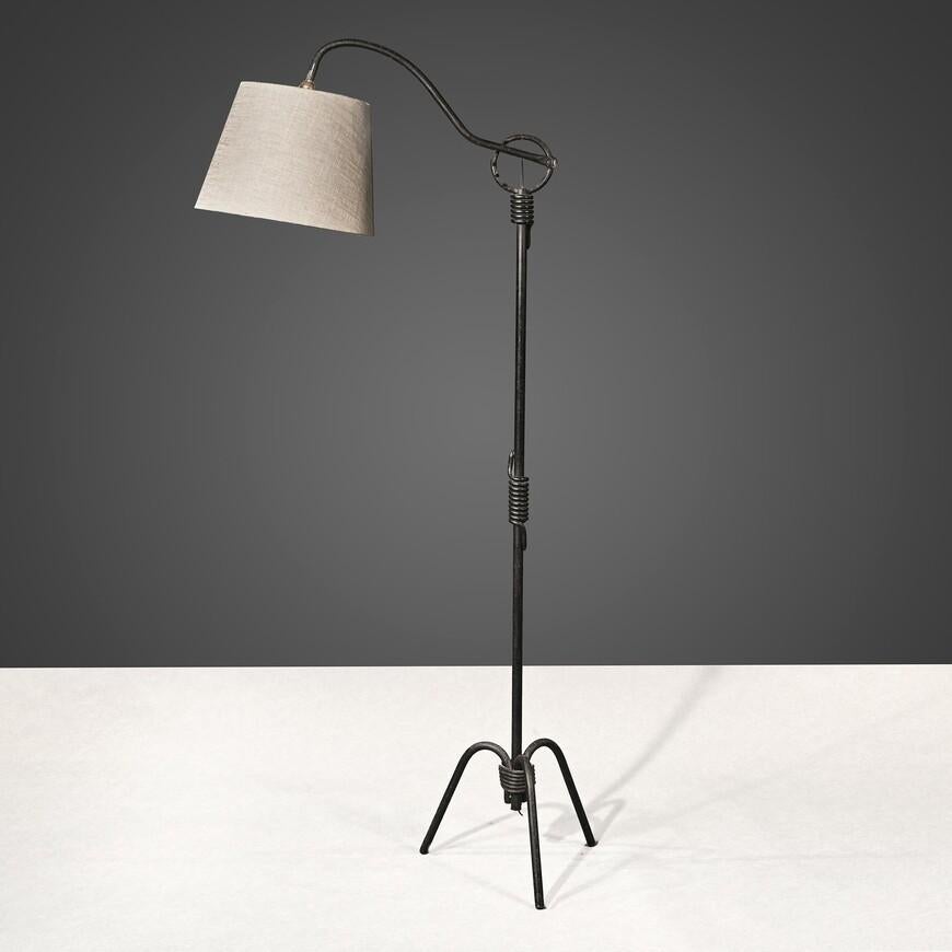 Jean Royère adjustable Iron standing Floor Lamp

France Paris circa 1940’s

In wonderful original condition by one of the most sought after mid 20th century French furniture and interior designers Jean Royère (1902-1981). 
The shaped arm is