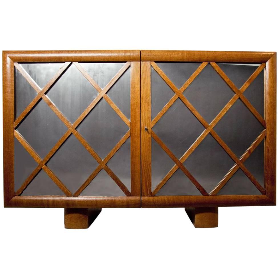Schrank „Croisillon“ von Jean Royere