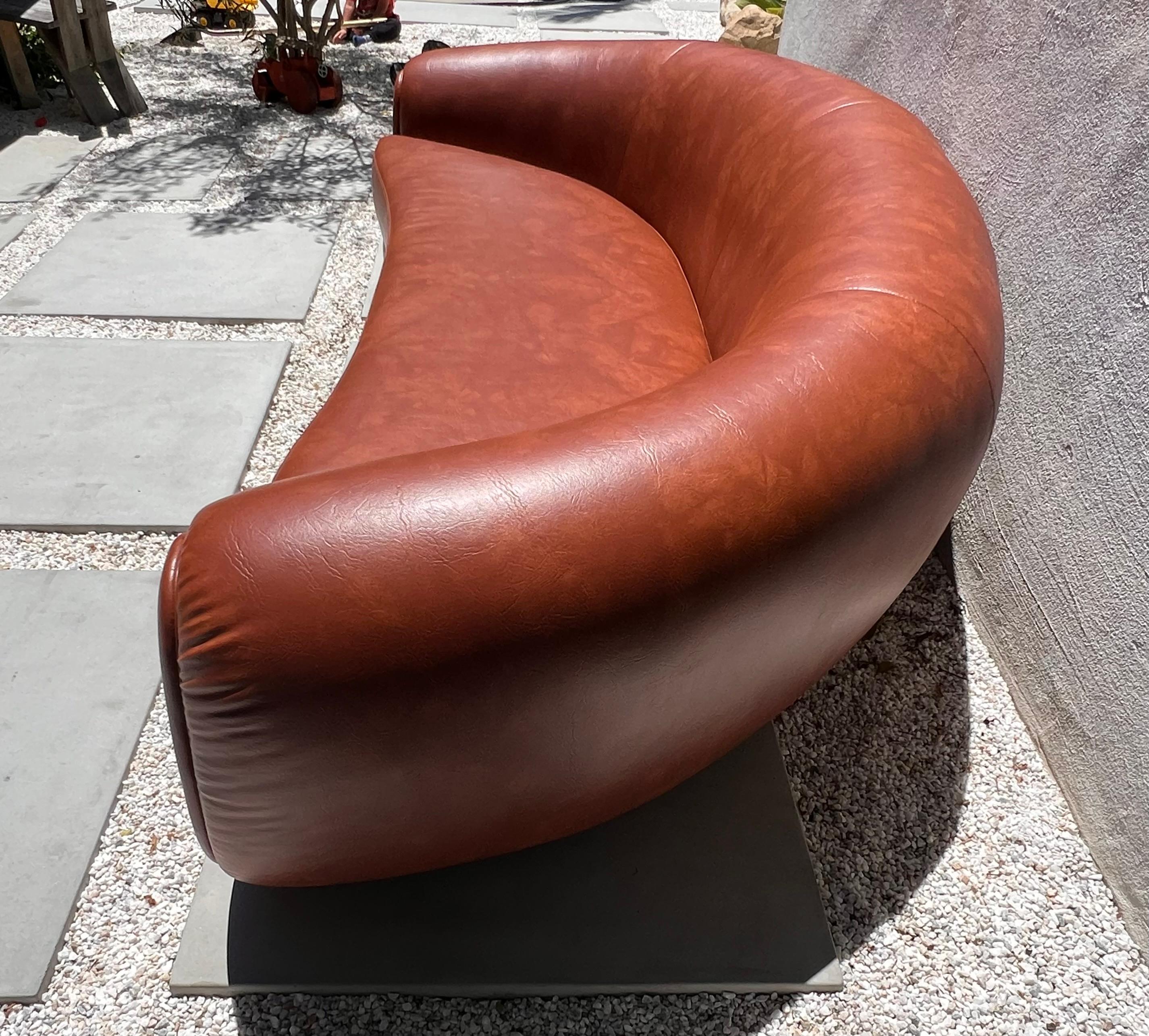 Jean Royère style curvy cognac pleather sofa, 21st century  For Sale 4