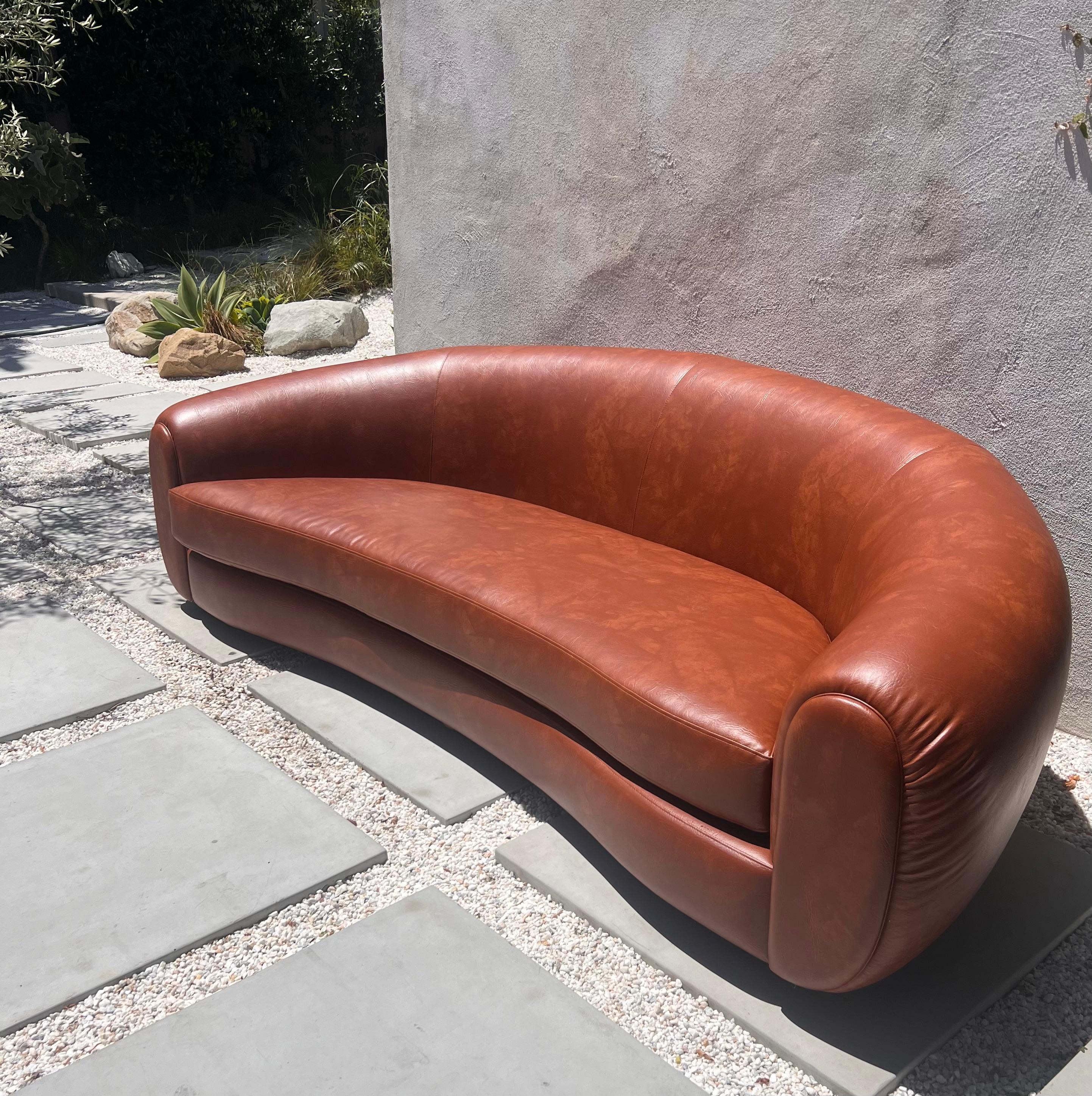 Jean Royère style curvy cognac pleather sofa, 21st century  For Sale 6