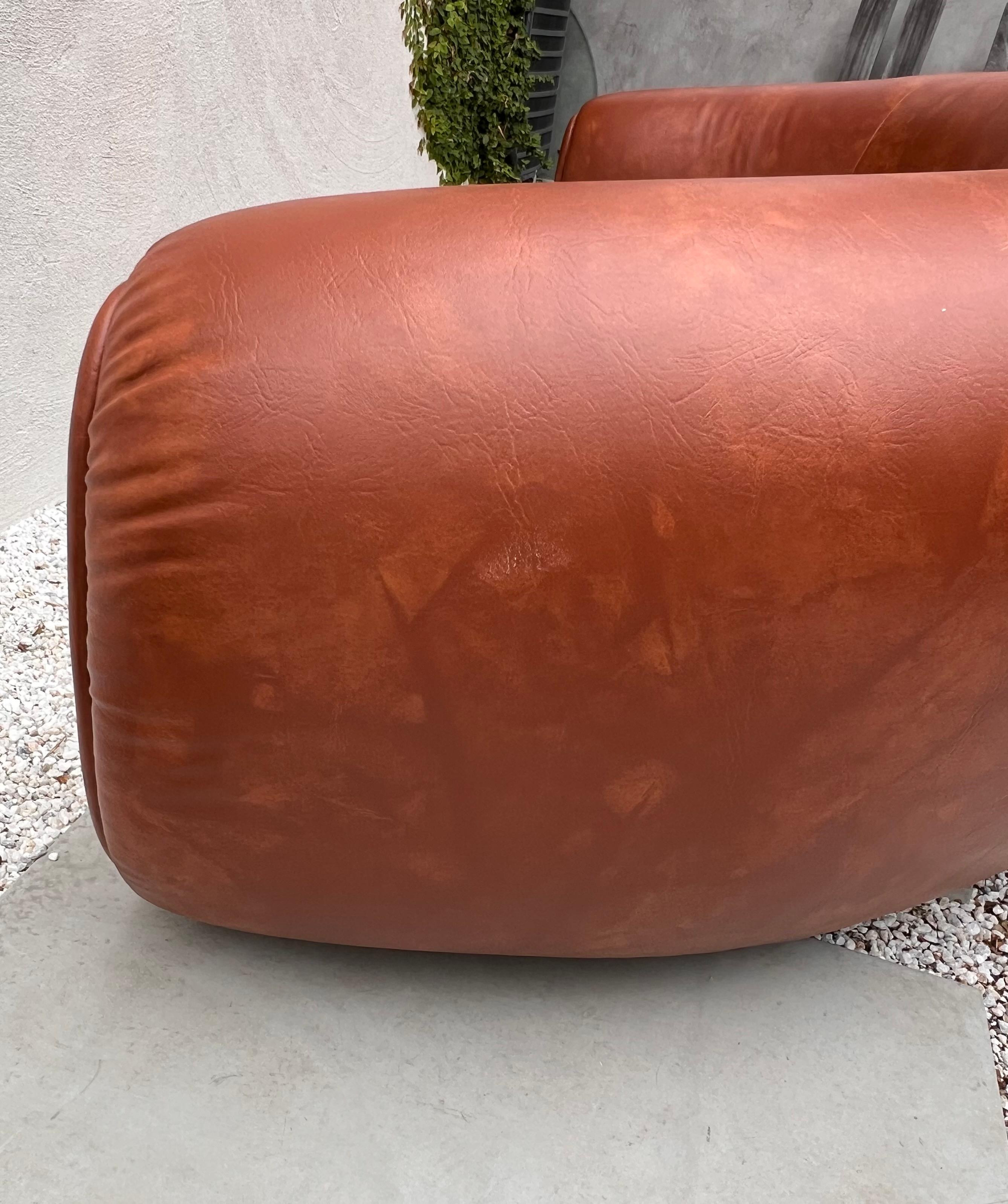 Jean Royère style curvy cognac pleather sofa, 21st century  For Sale 11