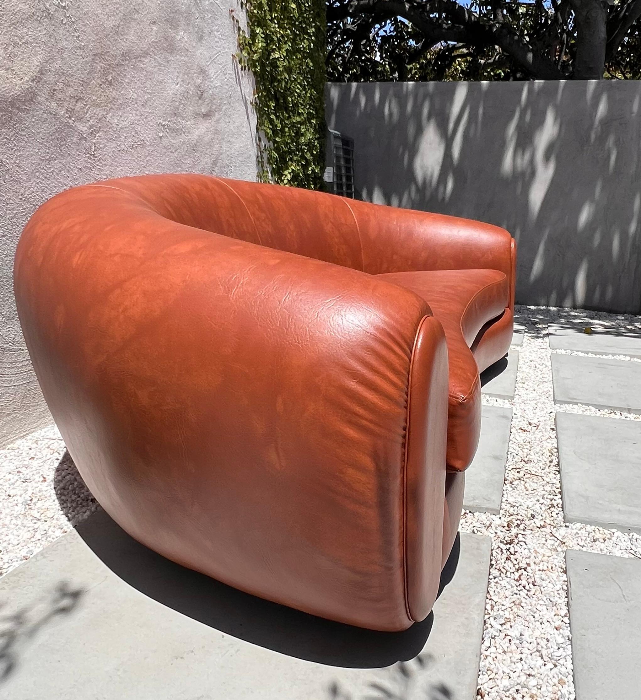 American Jean Royère style curvy cognac pleather sofa, 21st century  For Sale