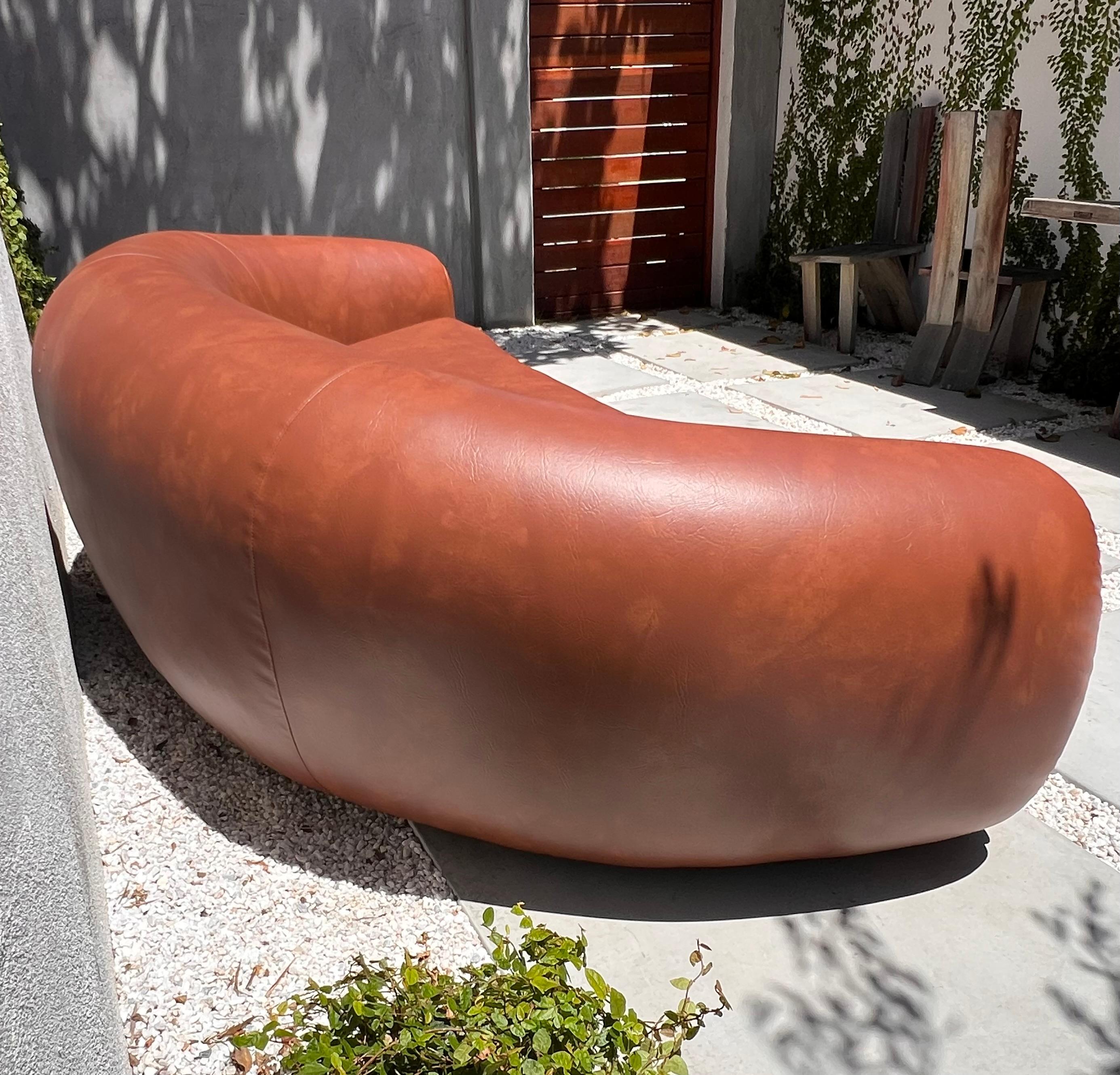 Jean Royère style curvy cognac pleather sofa, 21st century  In Good Condition For Sale In View Park, CA