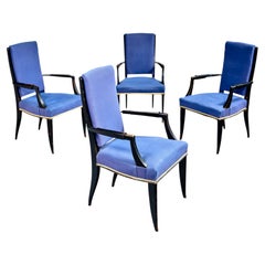 Jean Saint-Georges, Sillones de madera ennegrecida, tapicería azul, circa 1940