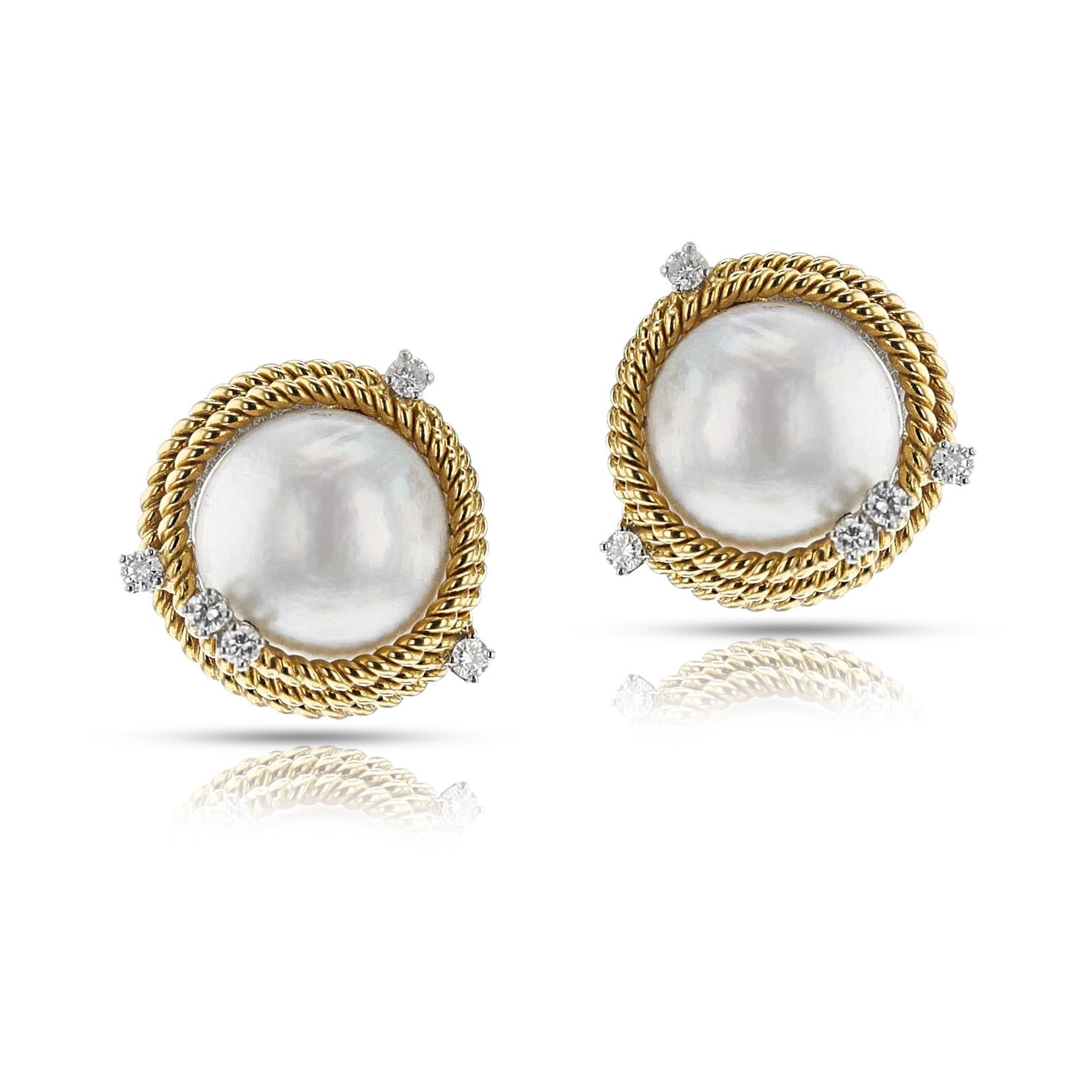 A beautiful pair of earrings made by Jean Schlumberger by Tiffany, with Rope-work Pearl and Diamond Earrings made in 18k. The cultured mabe pearl earrings have 0.50 carats of the diamonds, and the total weight is 22.1 grams. The dimensions are 20MM.