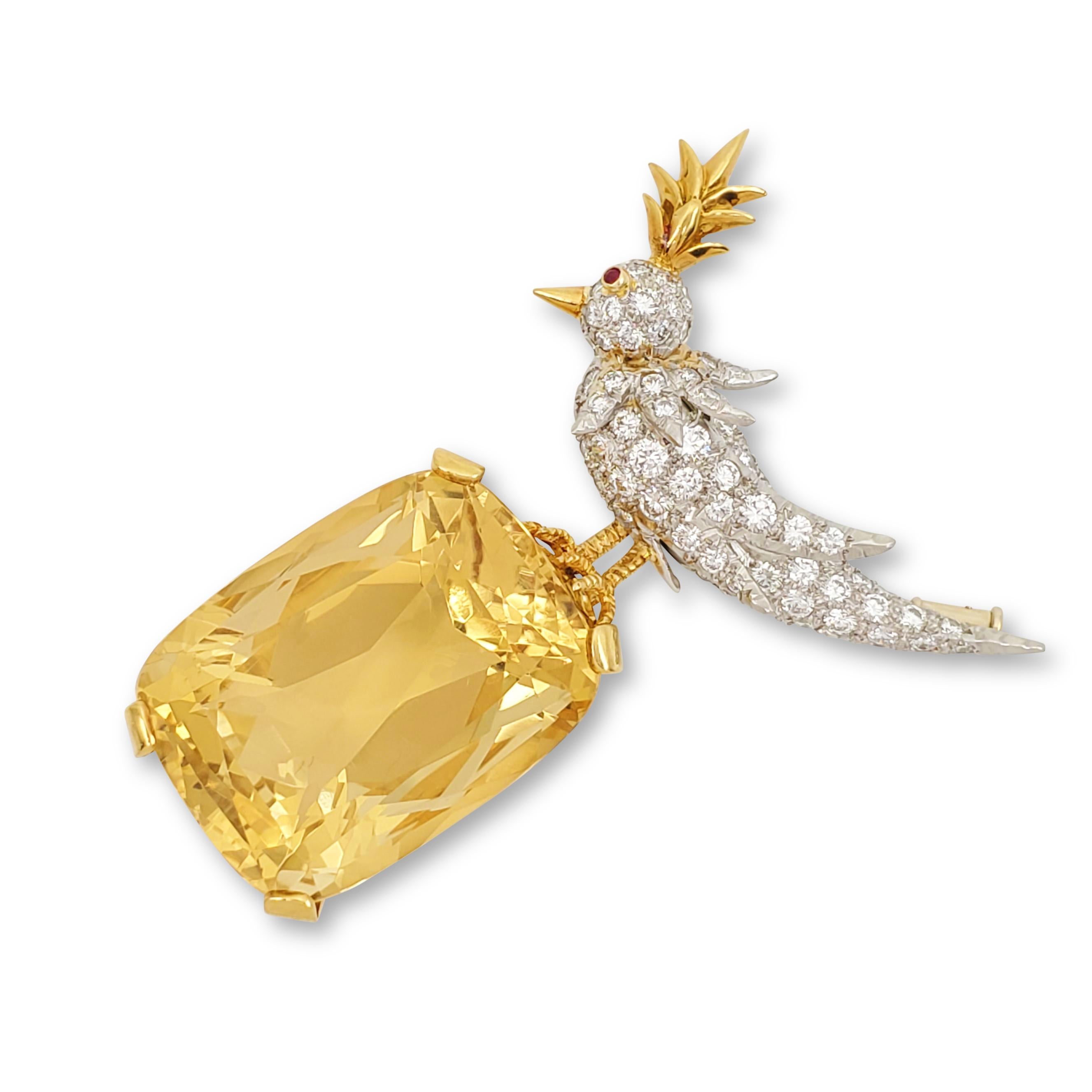 Authentic 'Bird on a Rock' brooch designed by Jean Schlumberger for Tiffany & Co.  Crafted in Platinum and 18 karat yellow gold, the brooch features a dazzling cushion-shaped citrine of 53 carats, 1 round cut ruby of 0.01 carat, and 71 round