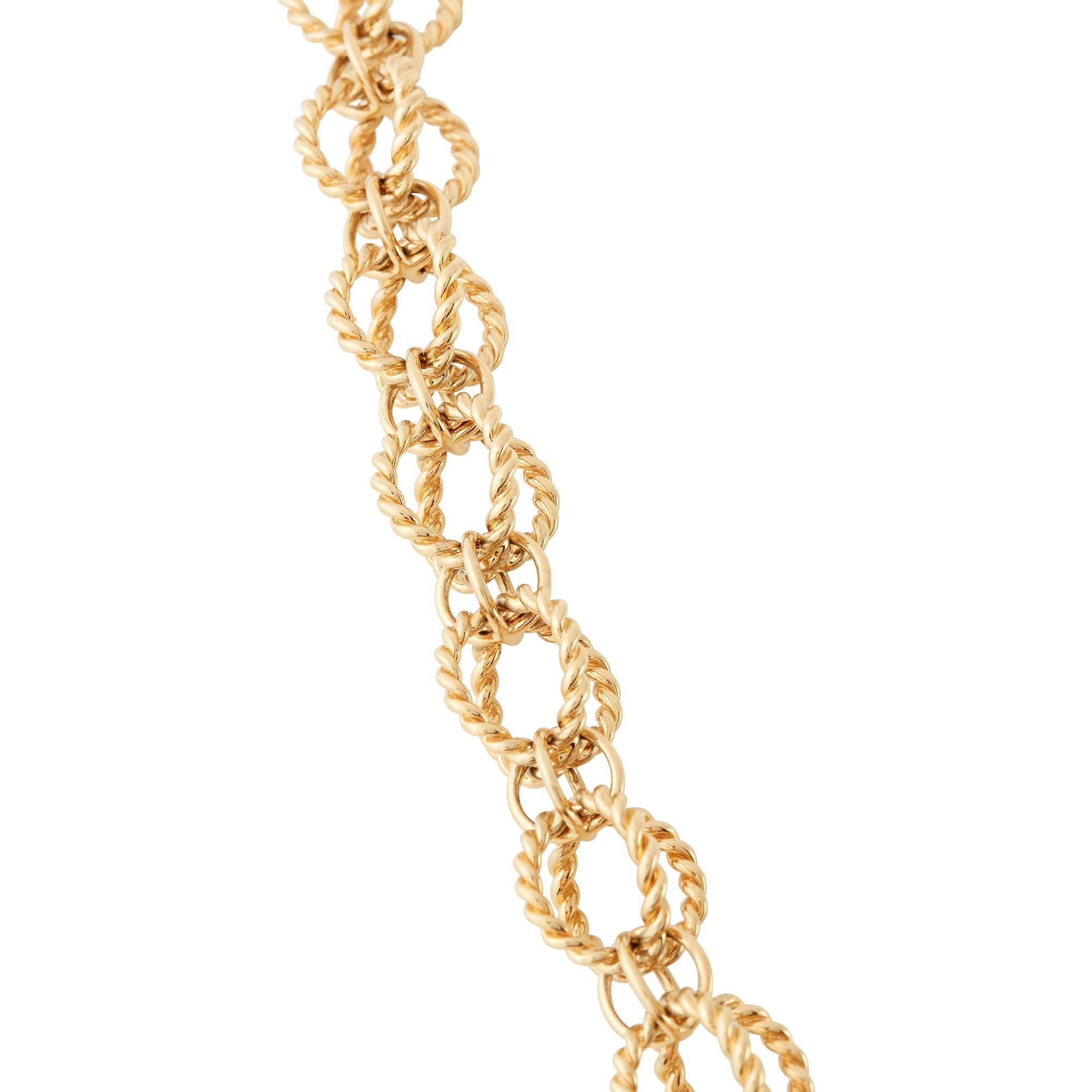 Authentic Jean Schlumberger for Tiffany & Co. Circle Rope necklace crafted in 18 karat yellow gold.  The necklace is comprised of interlocking spherical links of high polished rope-textured gold.  Necklace measures 18 inches in length and is