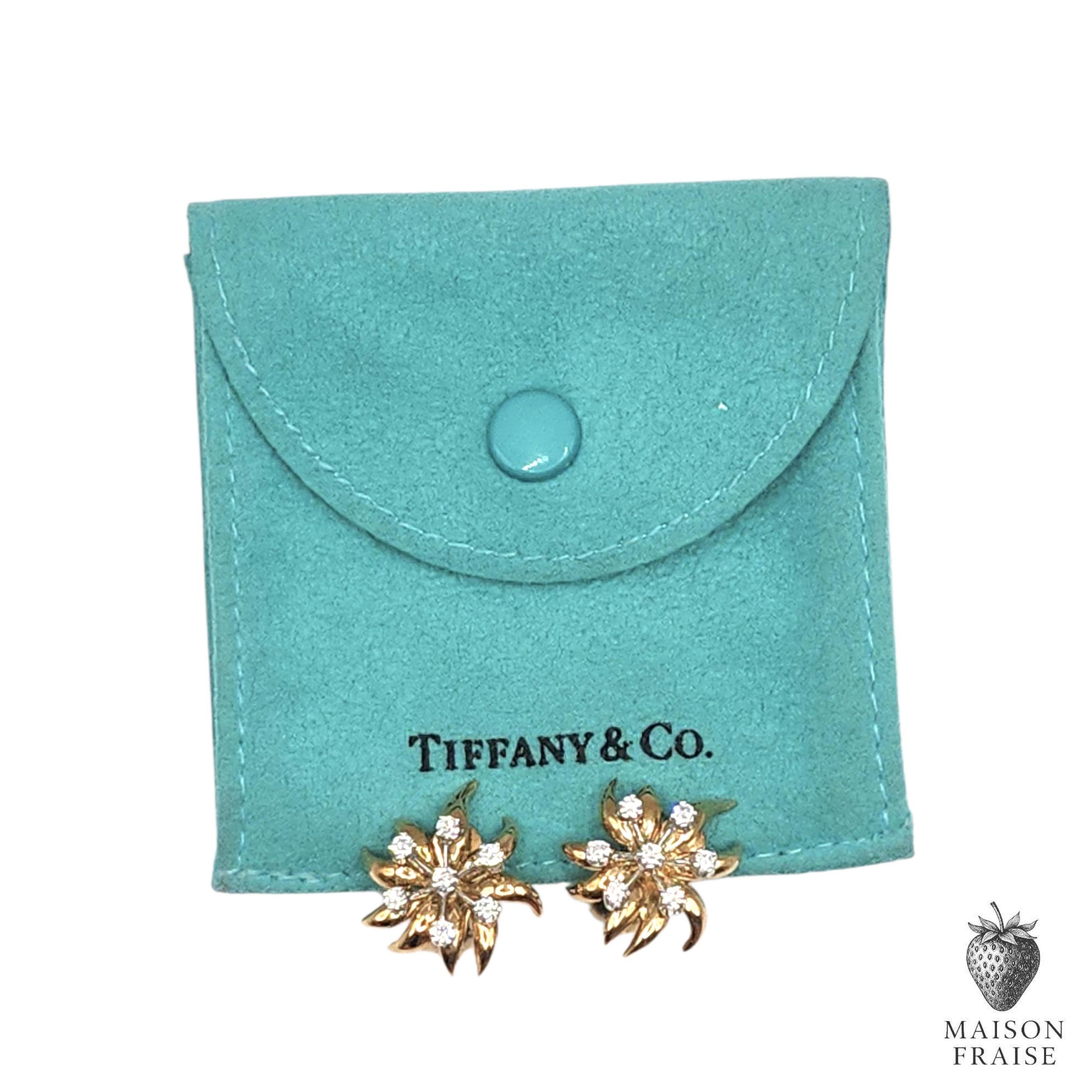 These striking ‘Flame’ earrings by Jean Schlumberger for Tiffany & Co. are a divine expression of movement and light, sculpted into one of Schlumberger’s most evocative motifs. Each earring is designed as a stylized flower or flame, unfurling with