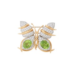 Jean Schlumberger pour Tiffany & Co. Broche papillon en péridot et diamant